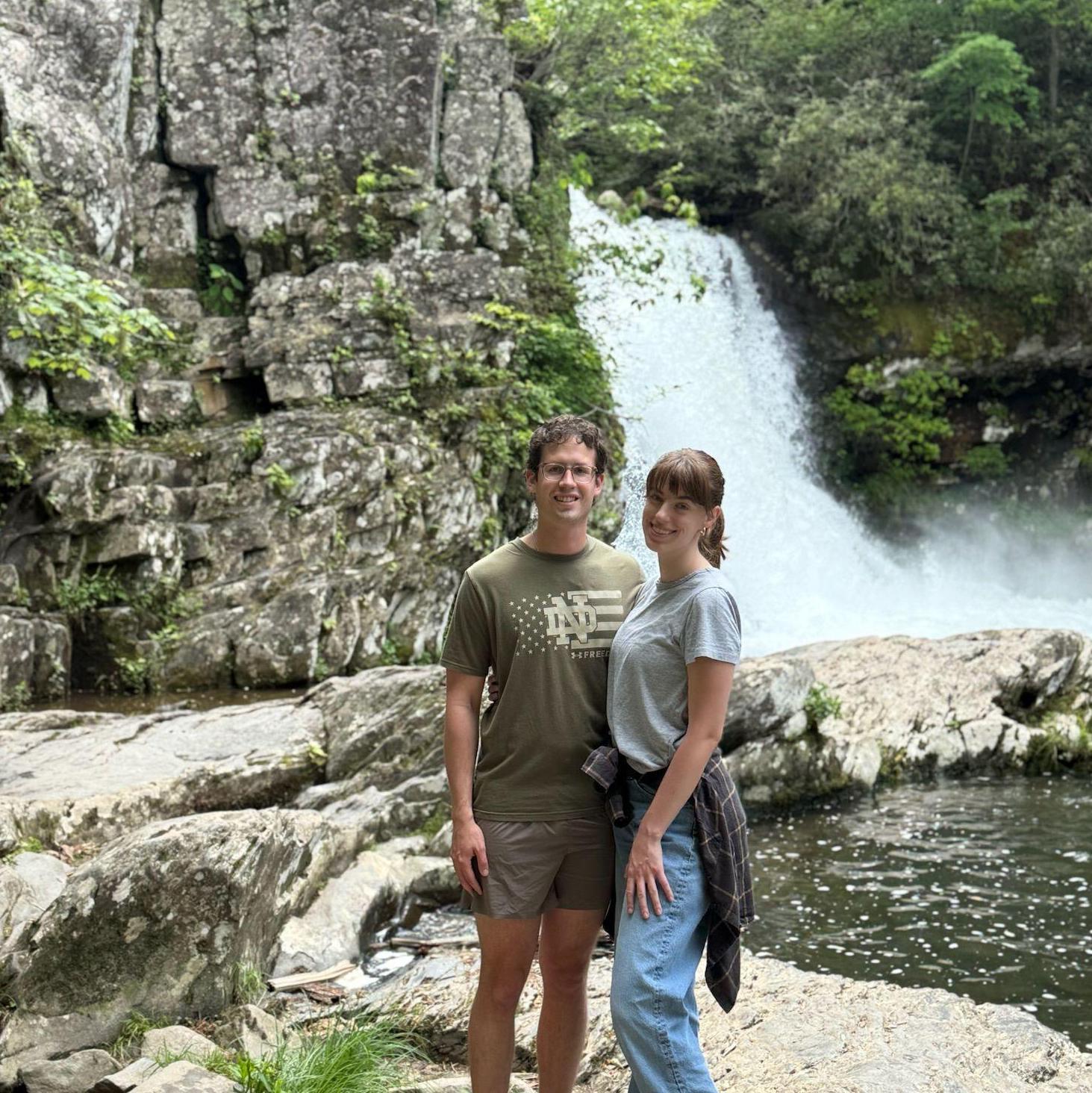 Grace and John-Luc by the Abrams Falls hike waterfall in the Great Smoky Mountains National Park. She was a park ranger intern there for a summer and loves to share what she learned with him.