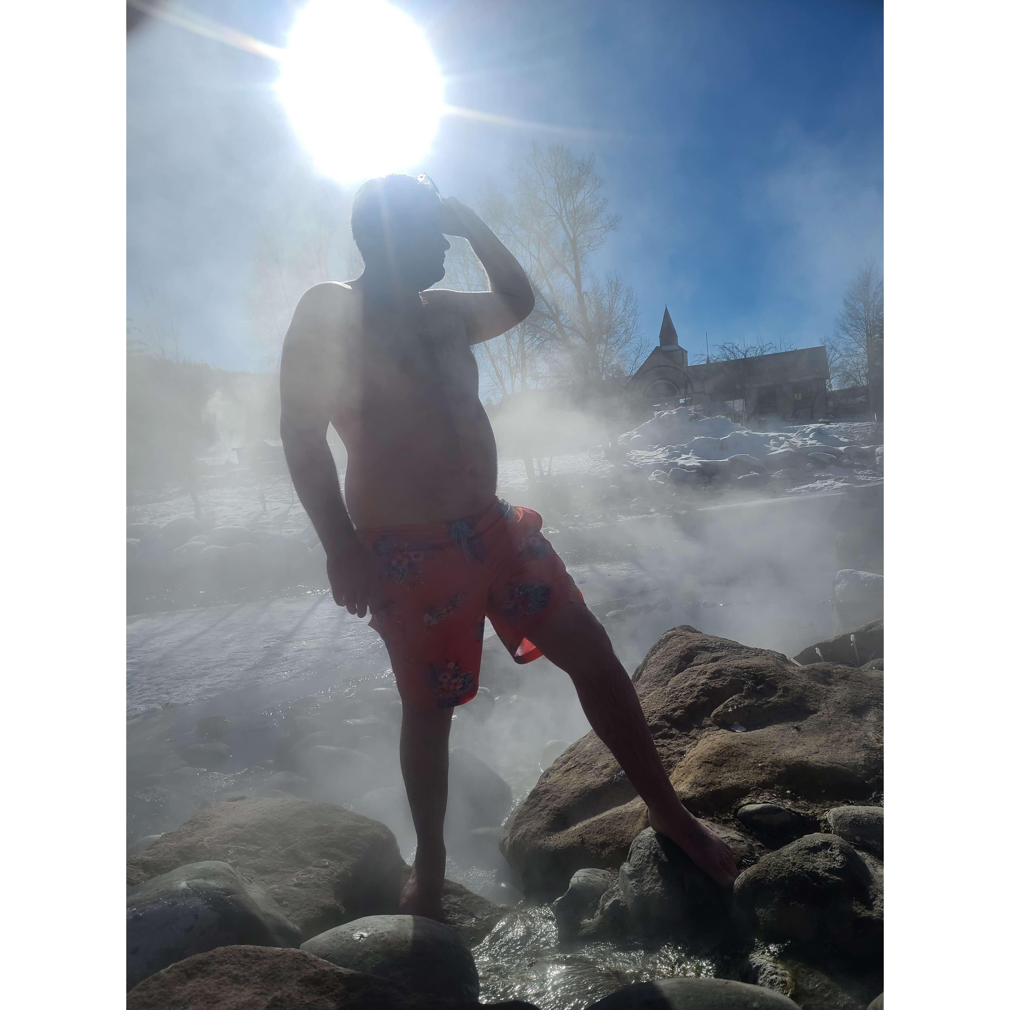 Enjoying the hot springs on a cool morning.