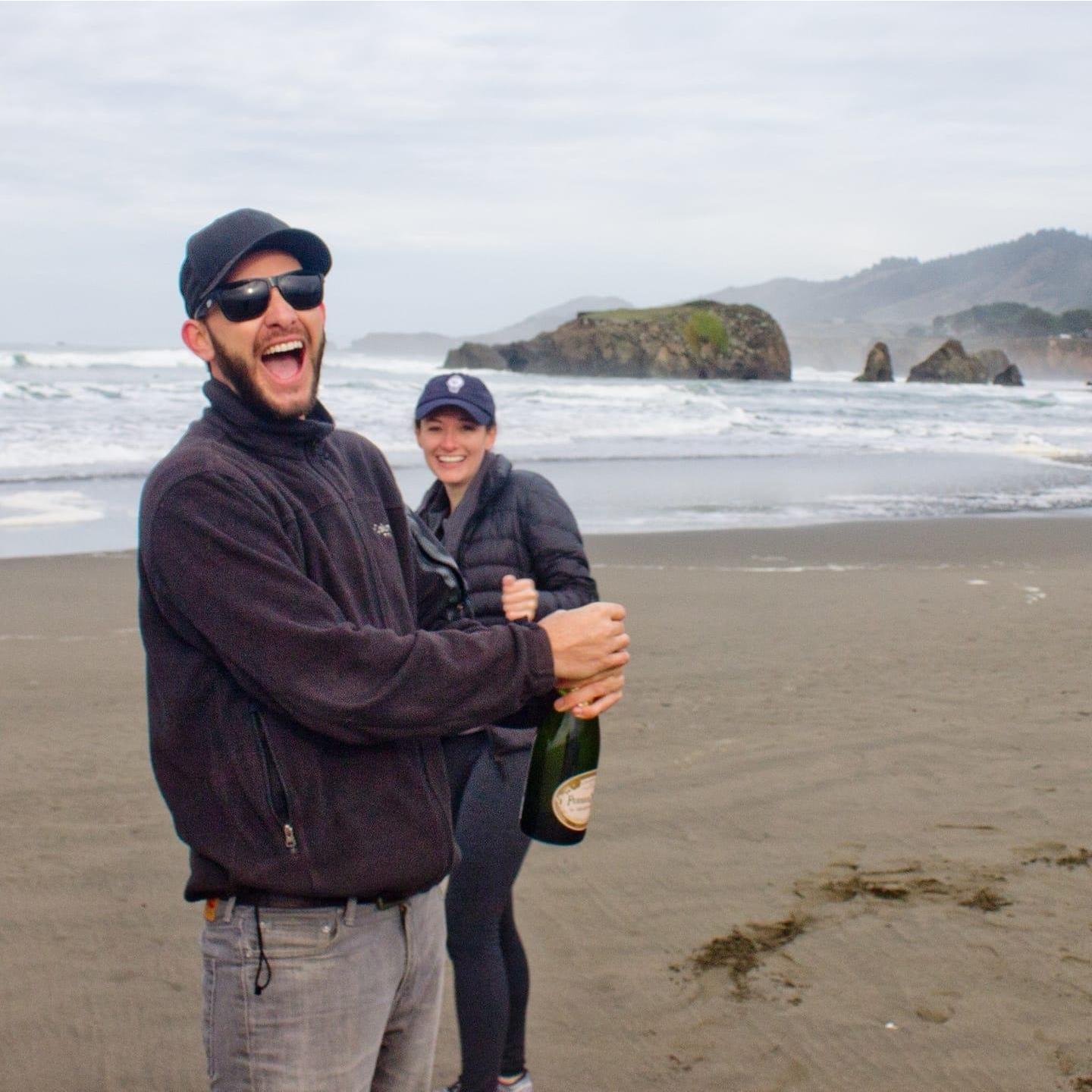 Popping Champagne after we got engaged!
