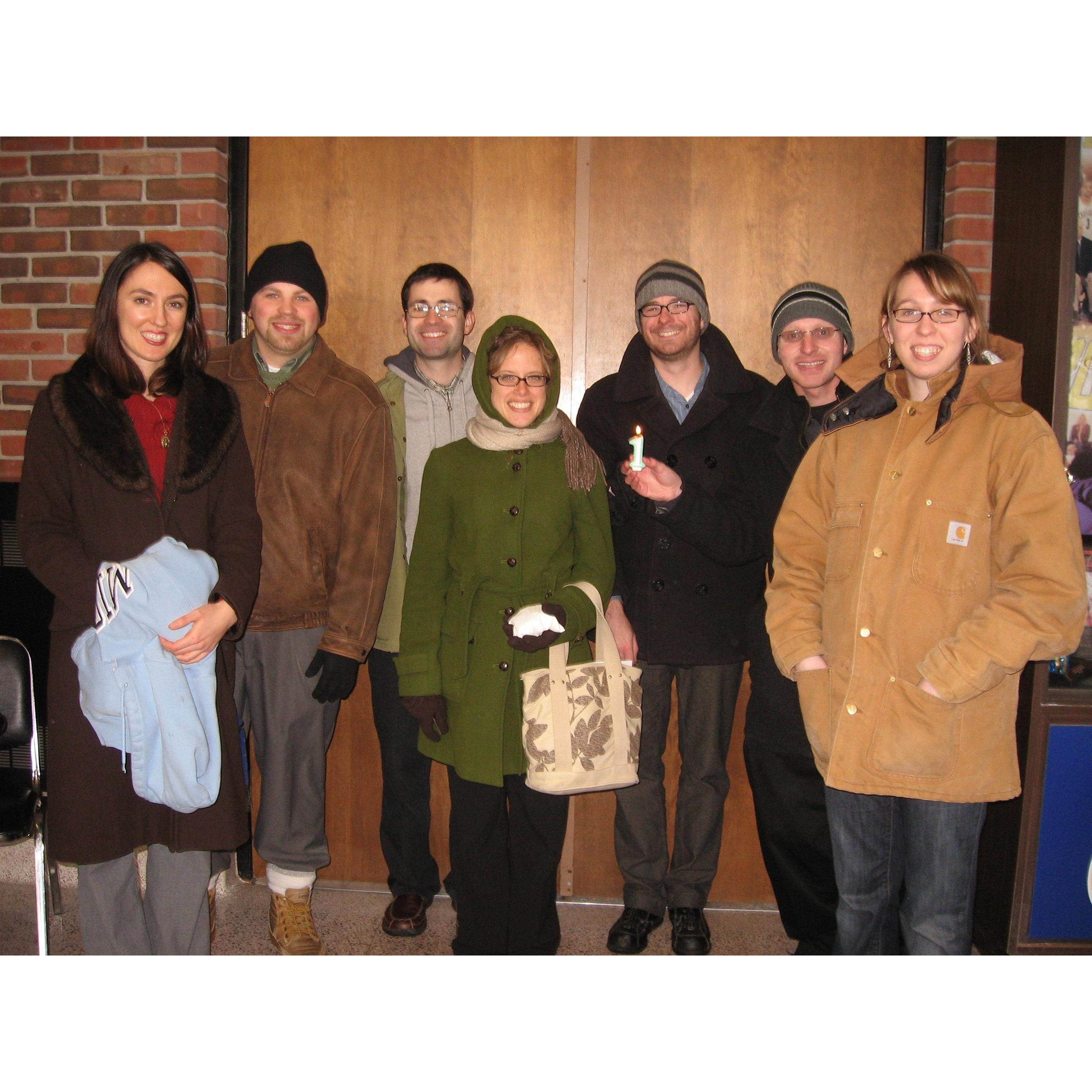 We met in the Veritas ("Truth") Young Adult Group for Catholics. This is our one-year anniversary as a group on January 2009.  Mark is in back center and Gayle is on the far right.