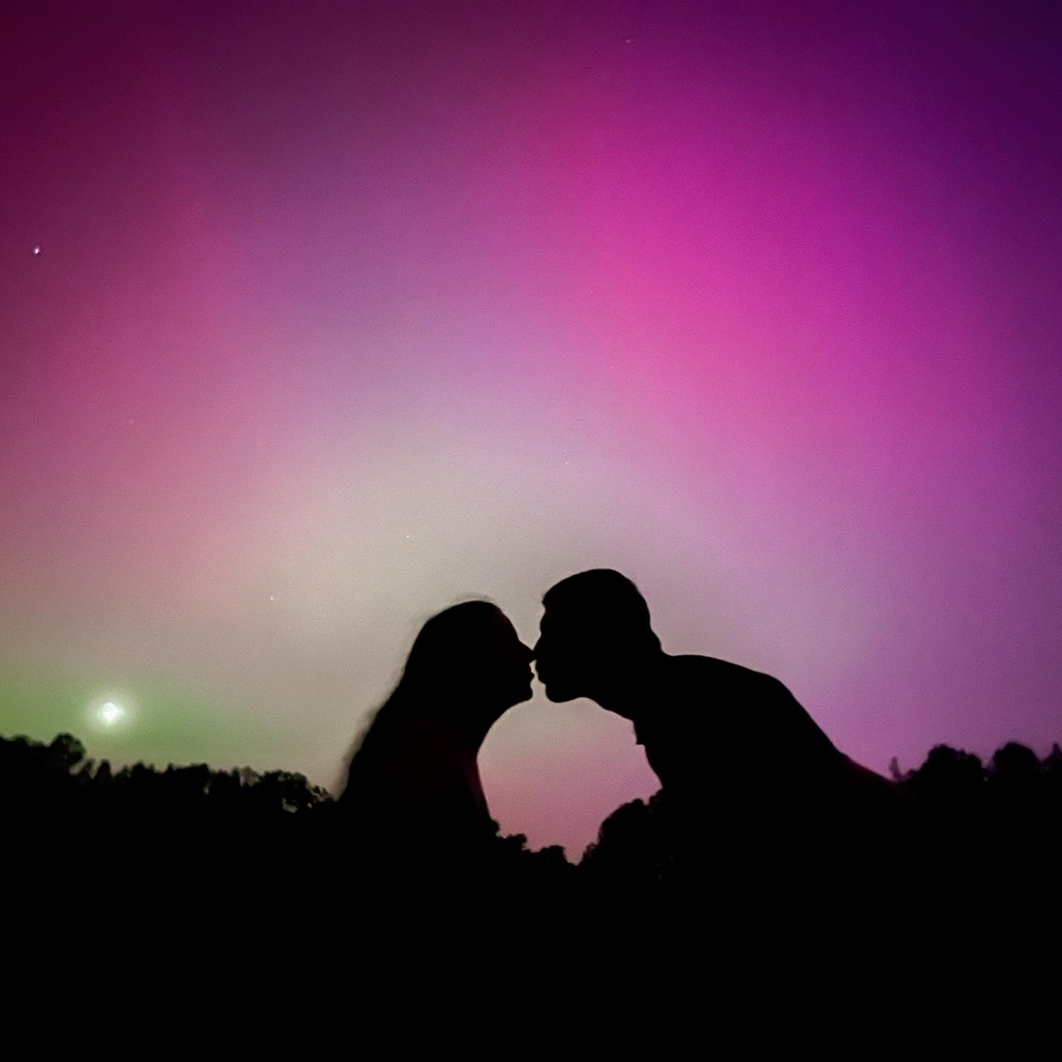 Kissing under the Northern Lights! In North Carolina!! Engaged!!! 🫀