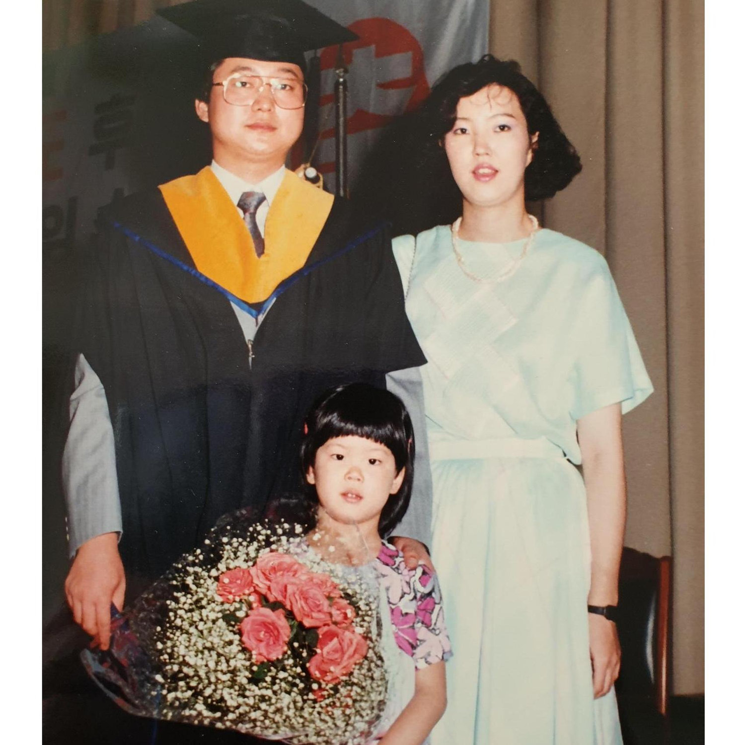 Dad, Mom, and HeeJin at Dad's doctorate graduation!
