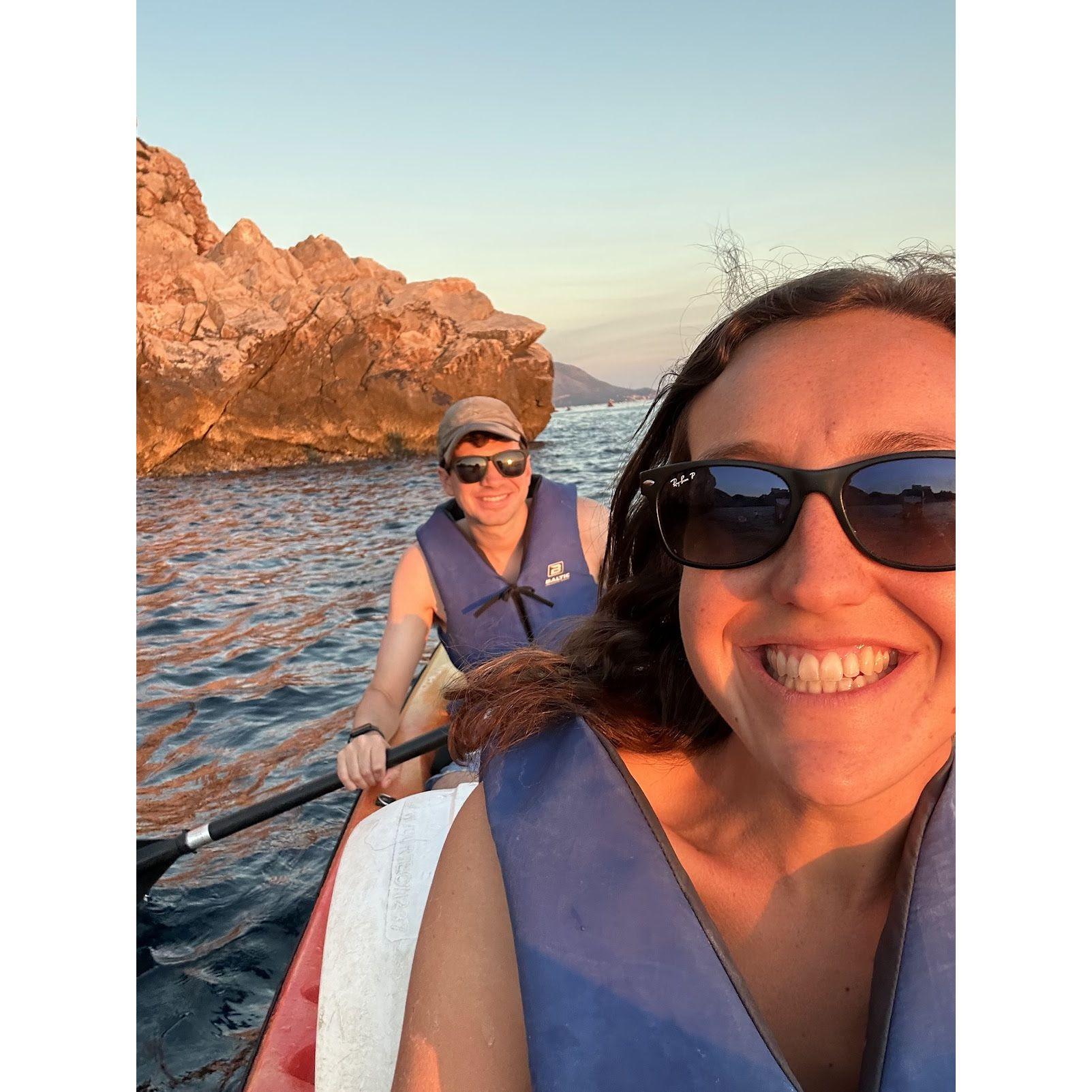 Kayaking in Croatia, Sabrina is terrible at directing the kayak but her swimming background definitely helps with the strokes