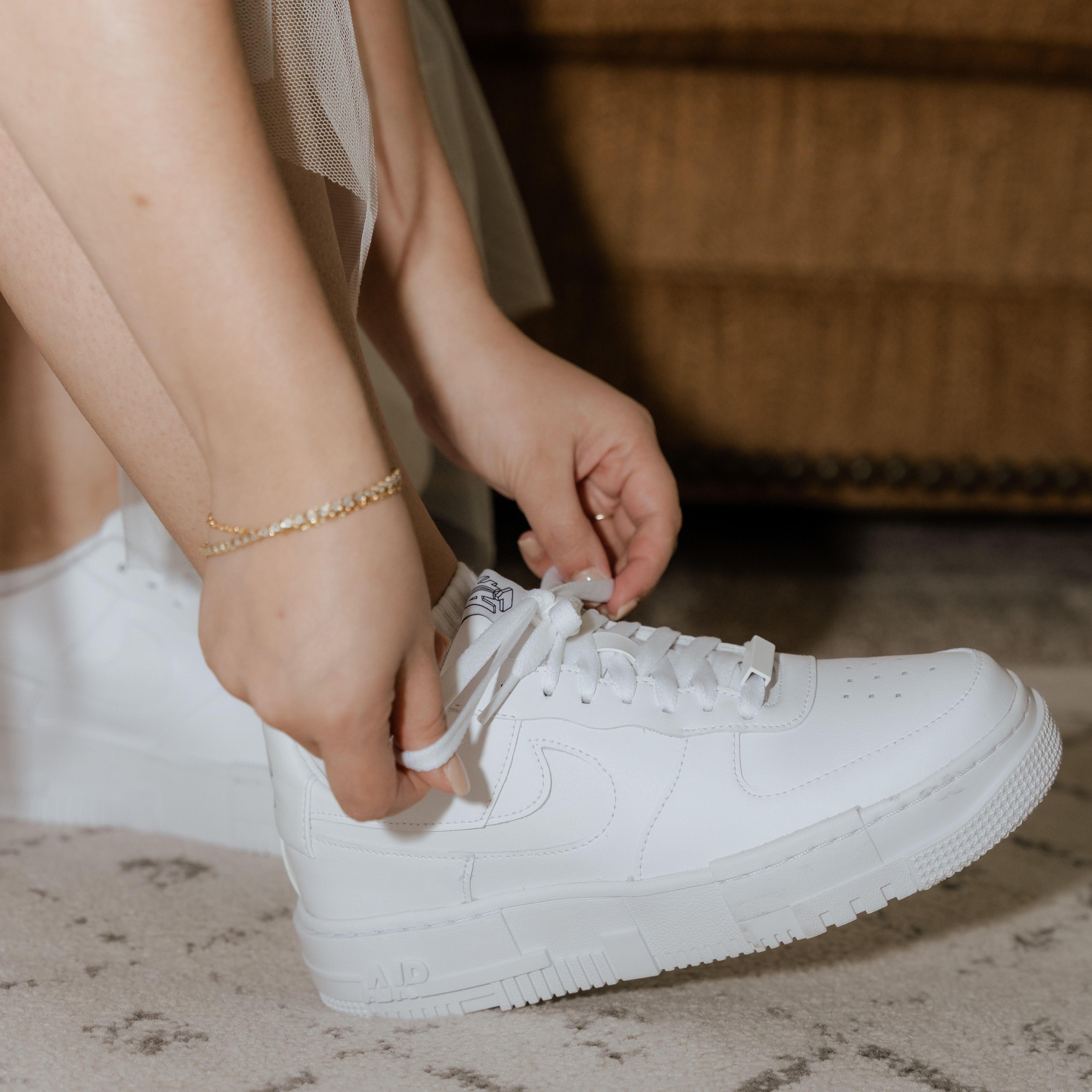 Tennis shoes over heels