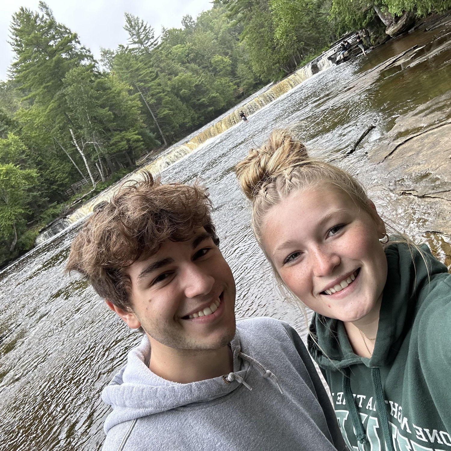 Us at Tahquamenon Falls State Park on a family camping trip