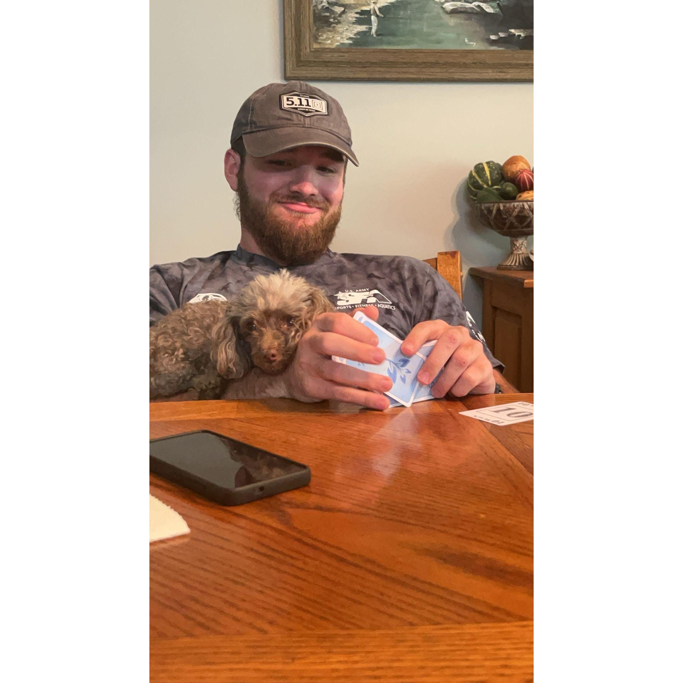 Our second Christmas and Bailey realizing that Coco just wants to be with him and not play cards