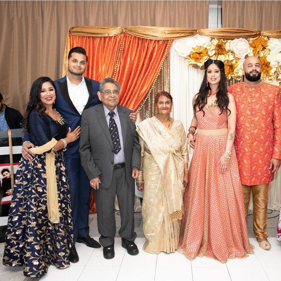 At his sister's engagement party with his grandparents