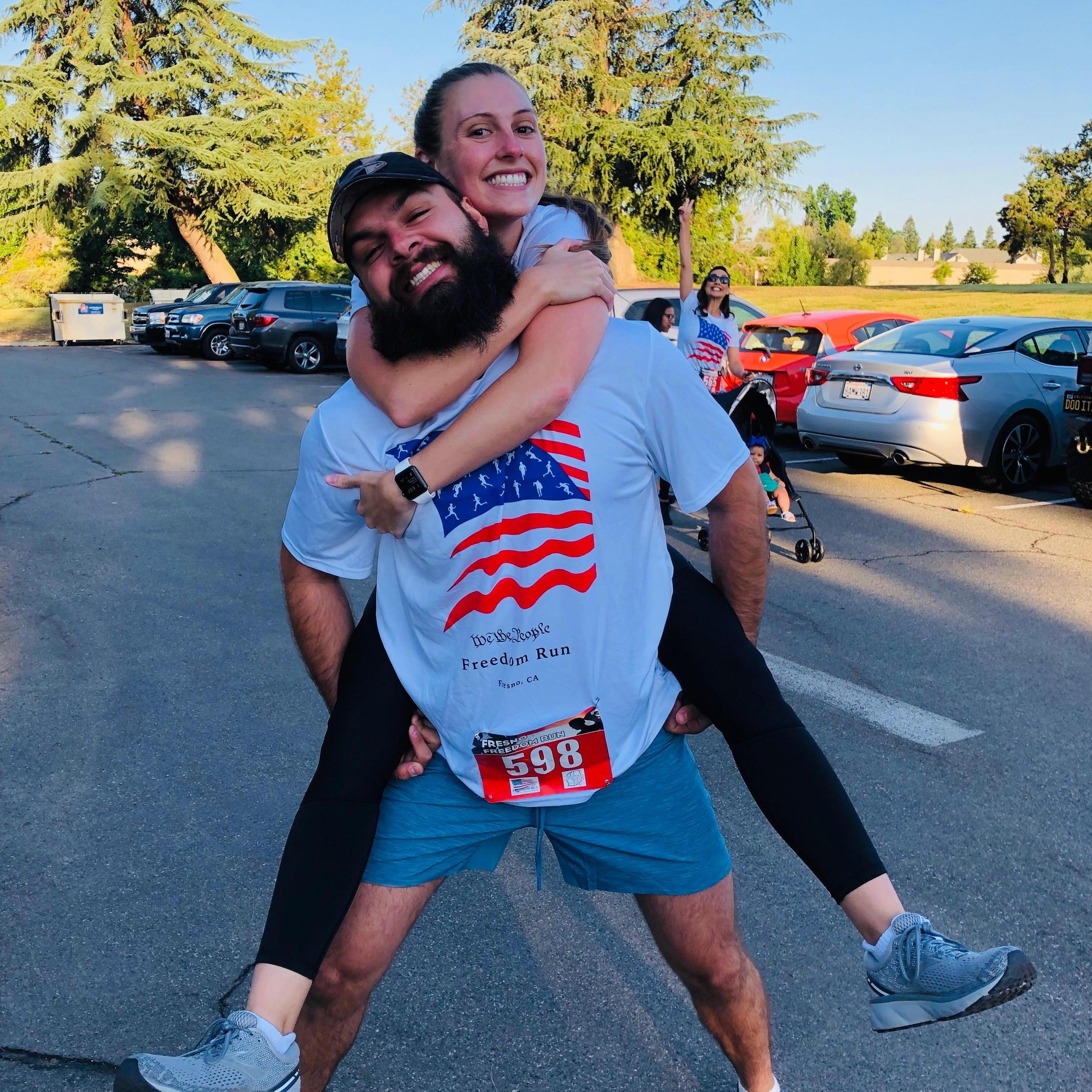 Our first competitive run together....(Miguel won!) and we got photo bombed.