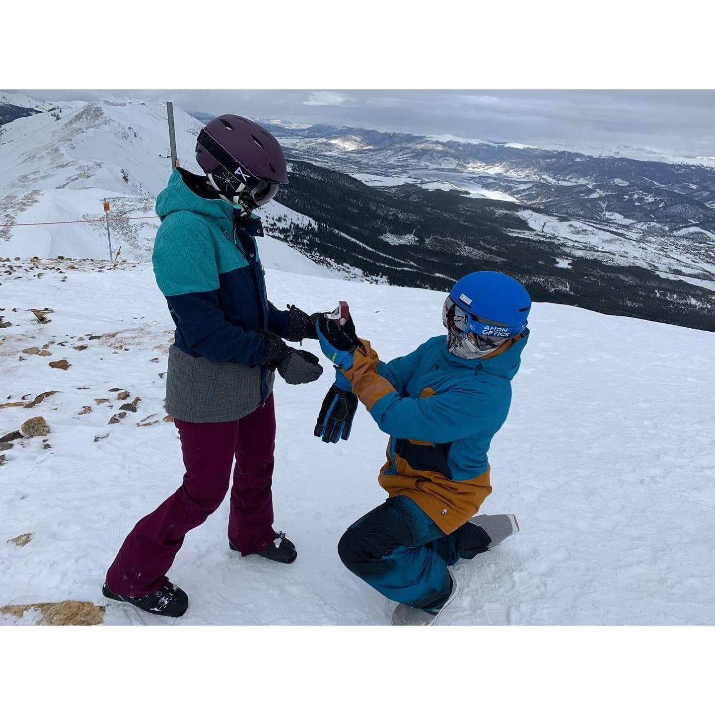 Blaise proposing at the top of a moutain