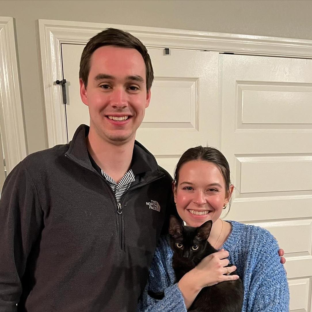 Us shortly after getting our kitty, Leia! She is a loved member of our family (Feb. 2024)