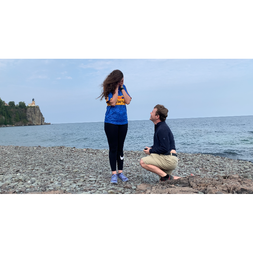Andrew proposing to Leslie on the shores of Lake Superior on July 30, 2021