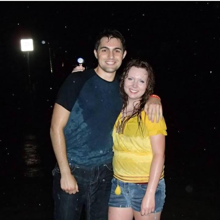 This was summer 2013, the first picture we ever took together! We were watching a movie with friends, and there was as HUGE rainstorm. The water is almost up to our knees in this picture!