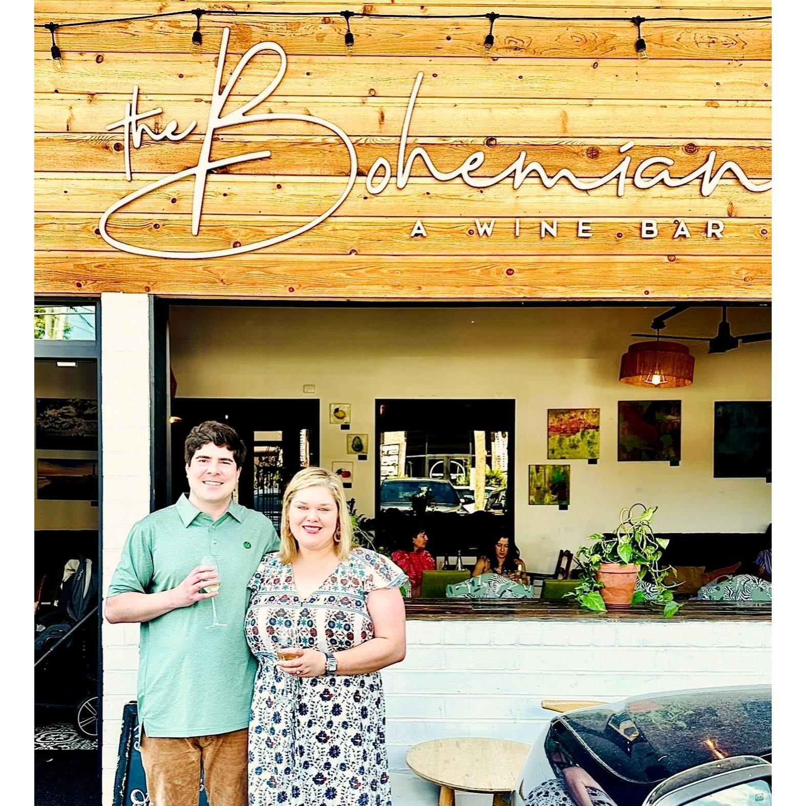 Our engagement at Bohemian Wine Bar in Plaza Midwood. The location of our first date!