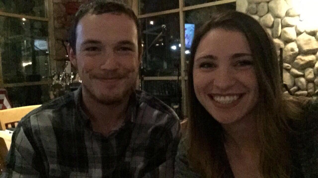 It was my first birthday we spent as a couple! Here, we are taking a picture at my birthday dinner.
