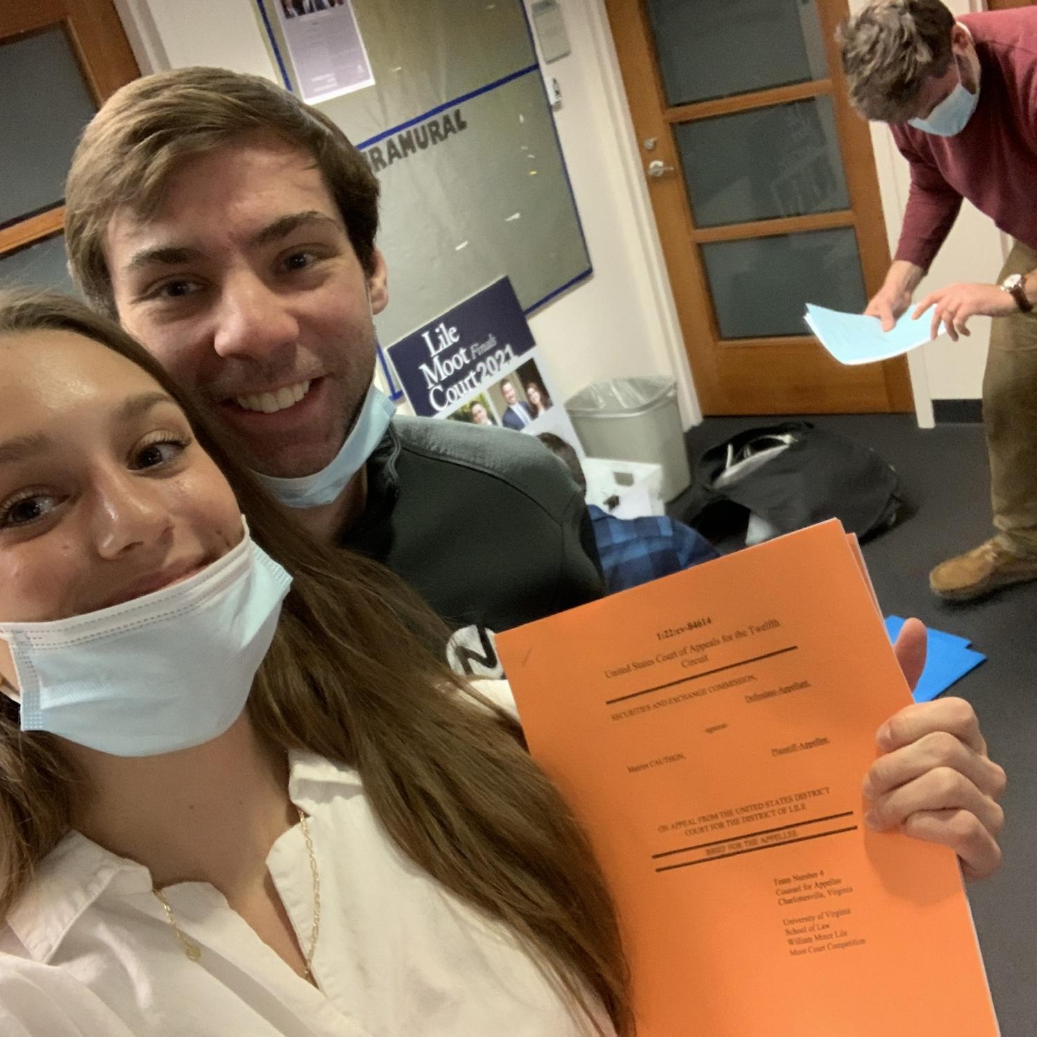 T & B turning in their moot court brief in the nick of time !