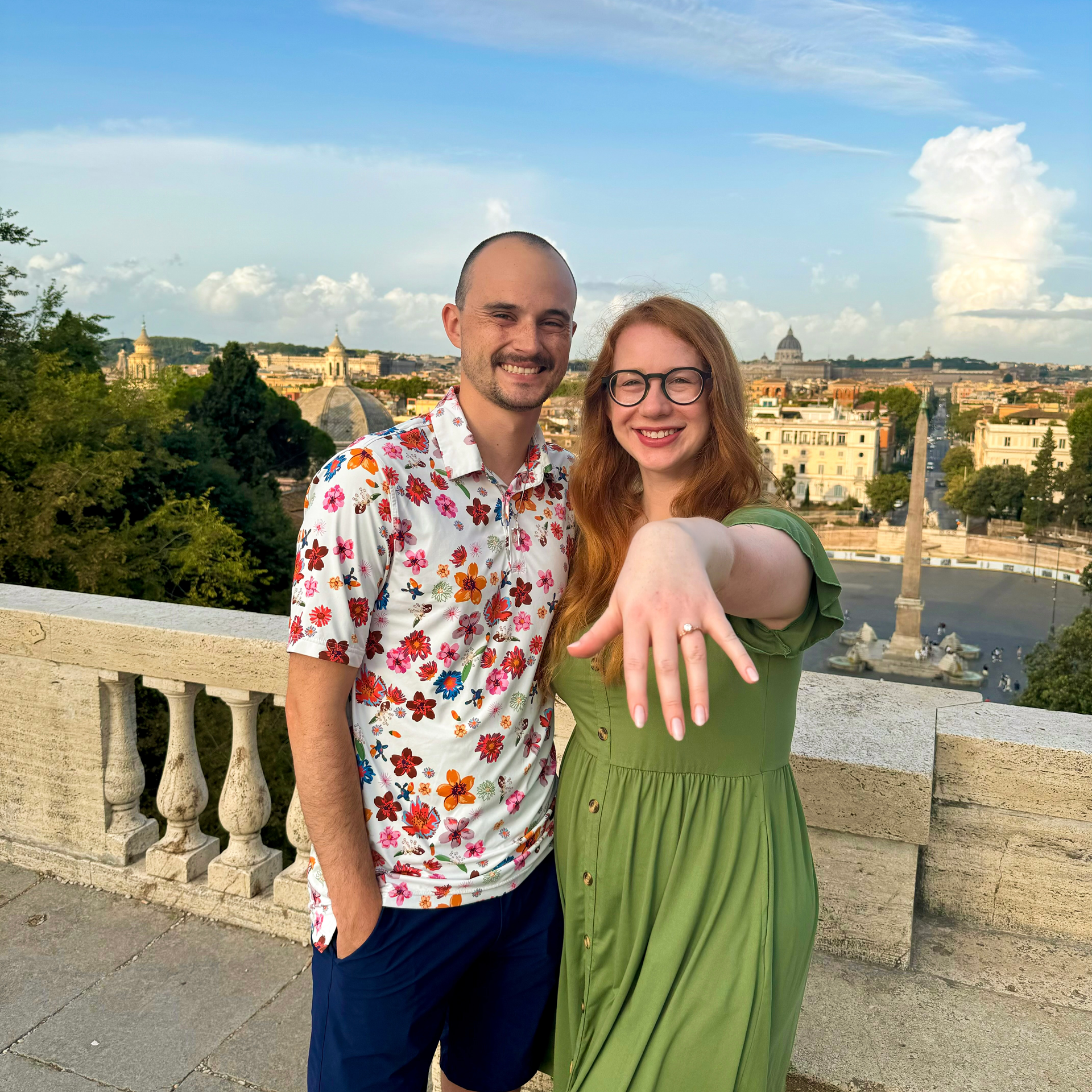 Adam proposed at an overlook of the Piazza del Popolo in Rome, Italy! Emily said yes. 8.19.2024