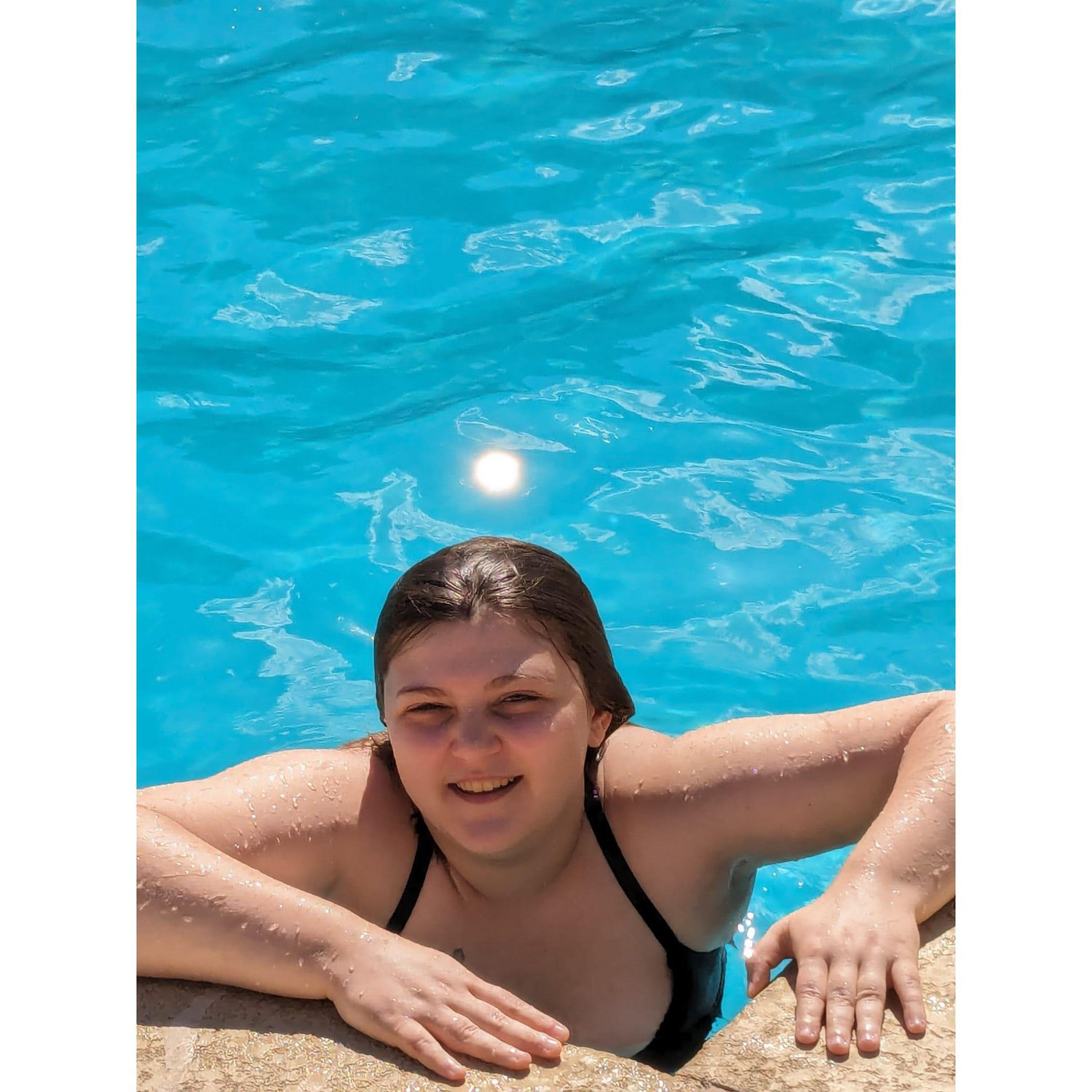Me in the pool at our apartment