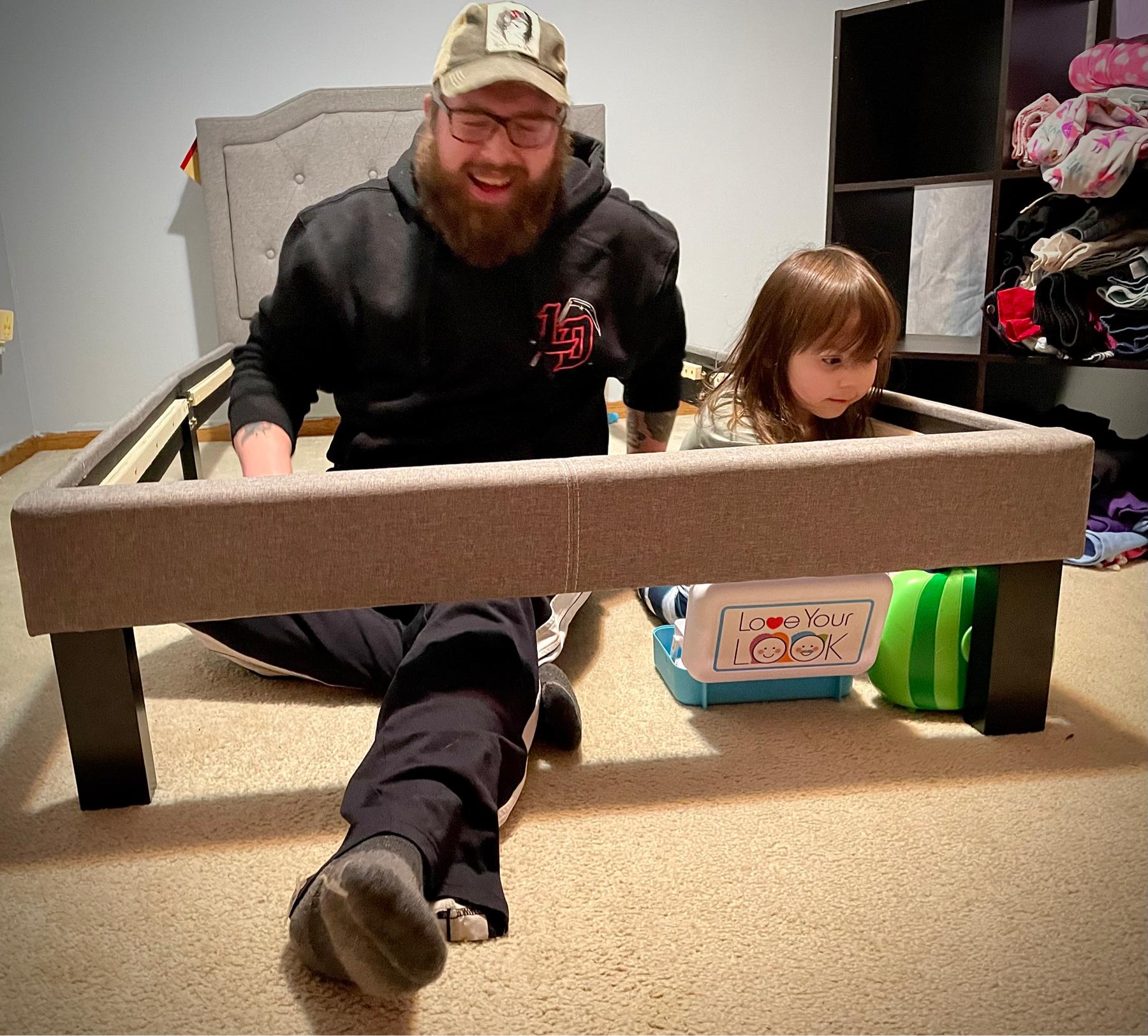 Harper helping Joe build her first big girl bed (1/2022)