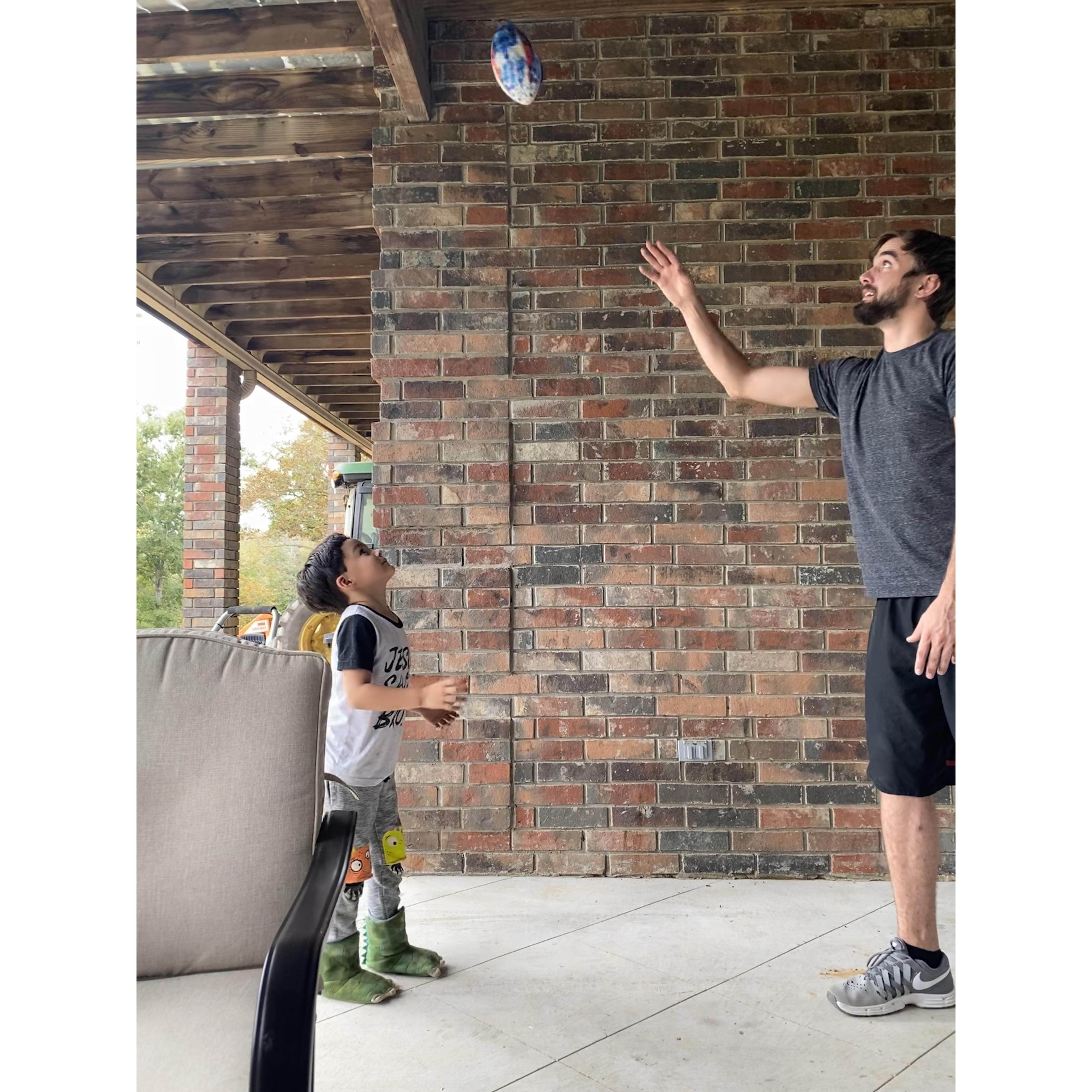 practicing catching the ball with bubs