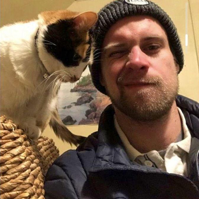 The photo that started it all. Look at that adorable cat. Oh, and Dan!