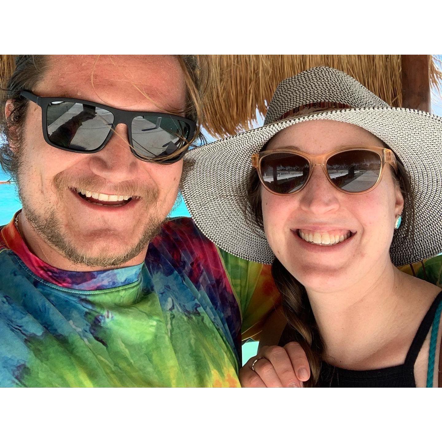 We took this photo on the pier in Puerto Murelos, Mexico where Ben proposed!