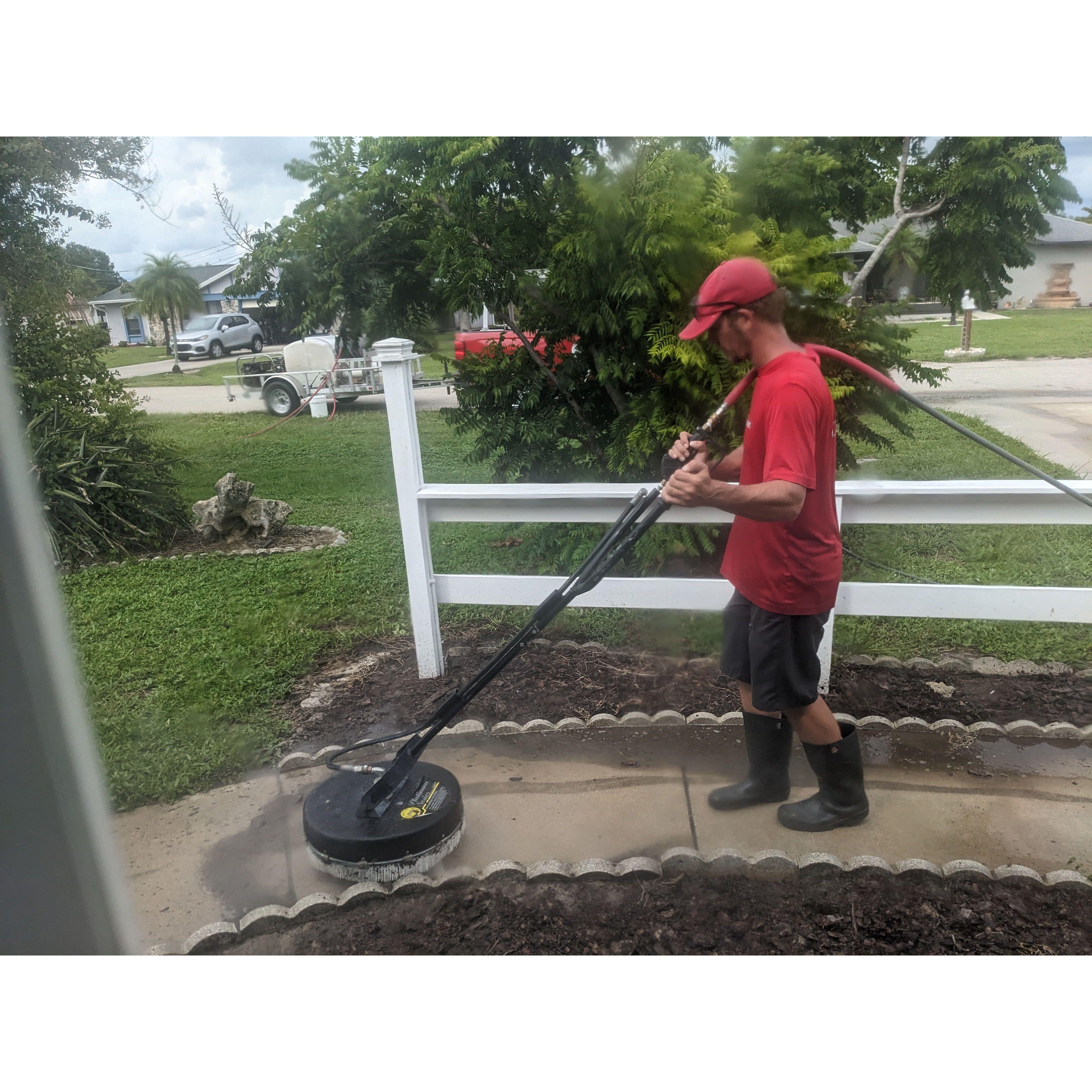 Jared hard at work cleaning up our house