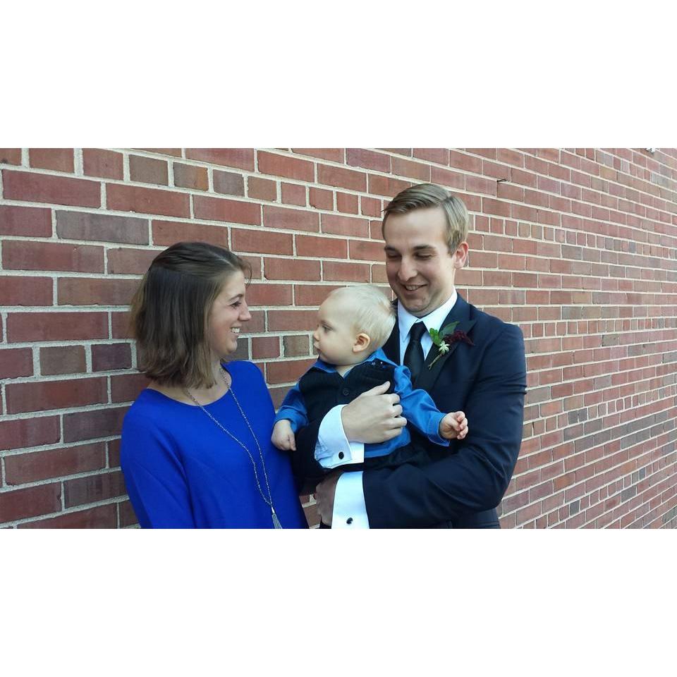 Enjoying Andrea and Omar's wedding with one of Ben's godsons (2016).