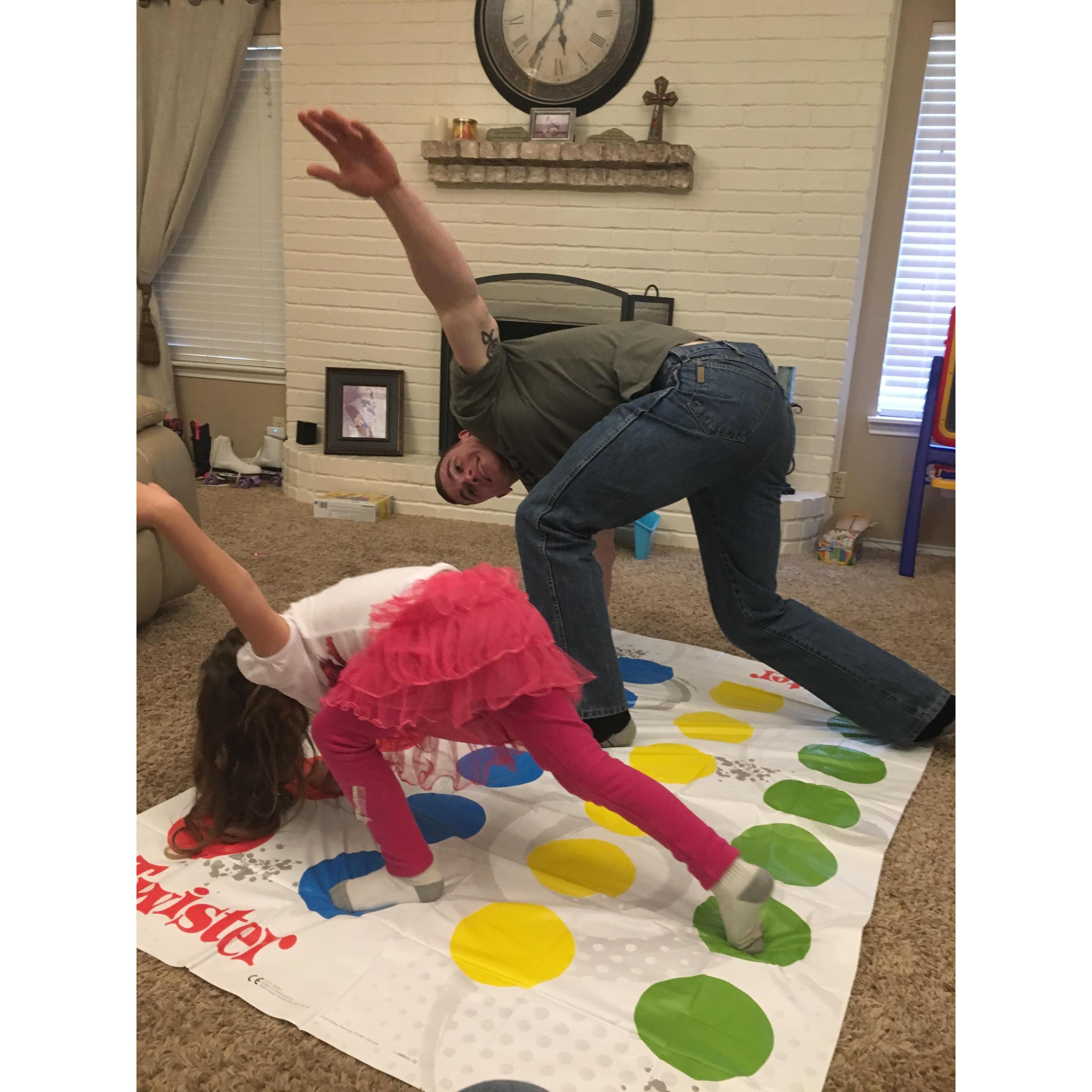 Hannah and tyler playing twister. Lol