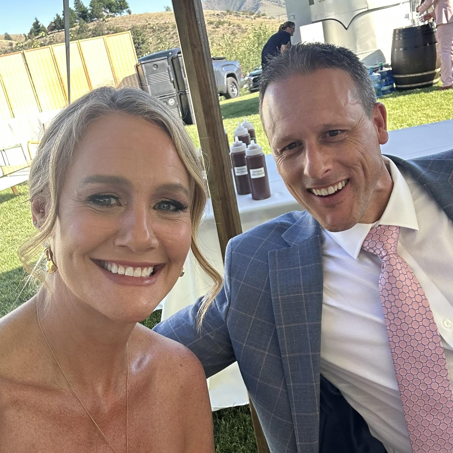 Cory and Lara at a wedding in June 2025