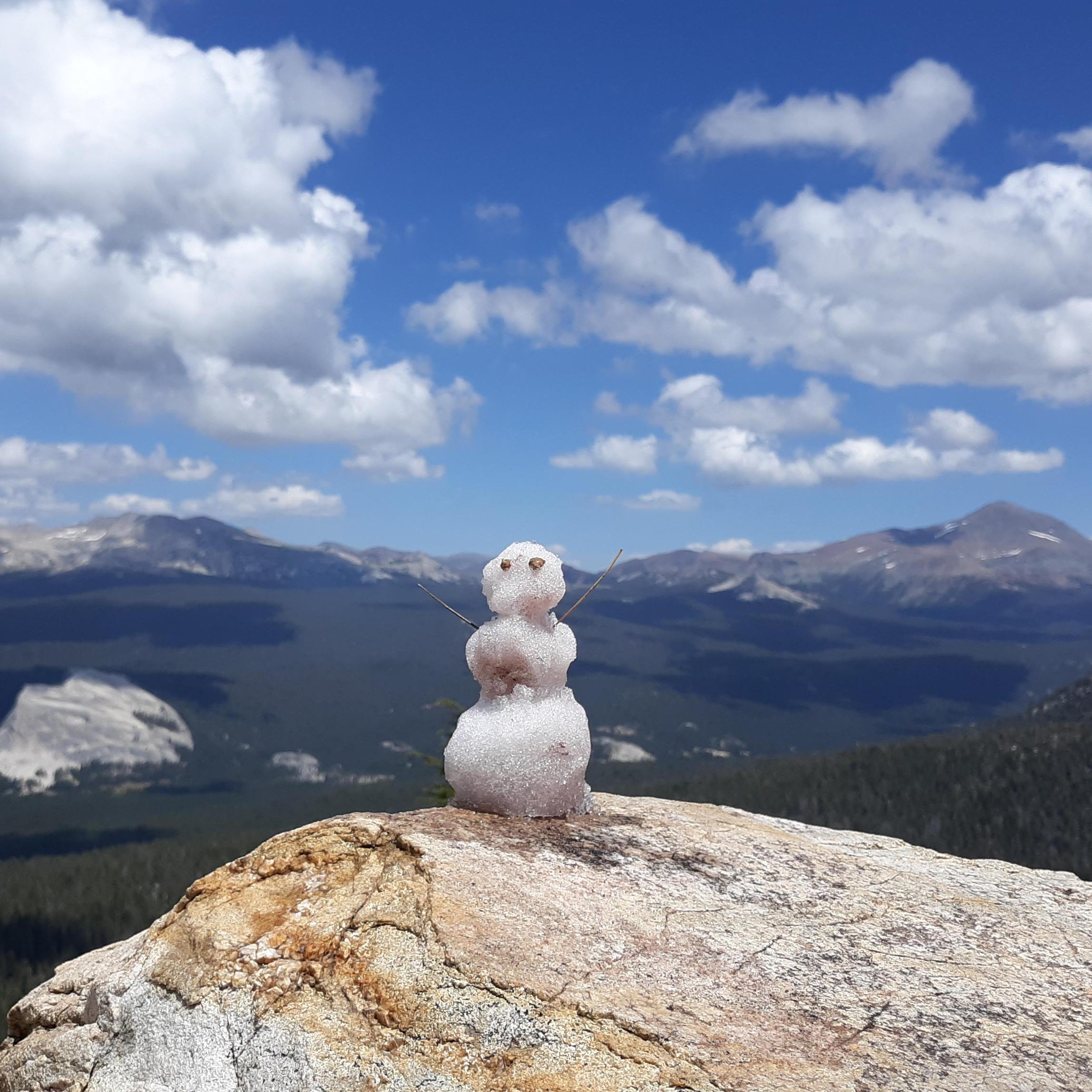 When we hiked the JMT, Micah made a snow man on top of every peak, this was the first of many