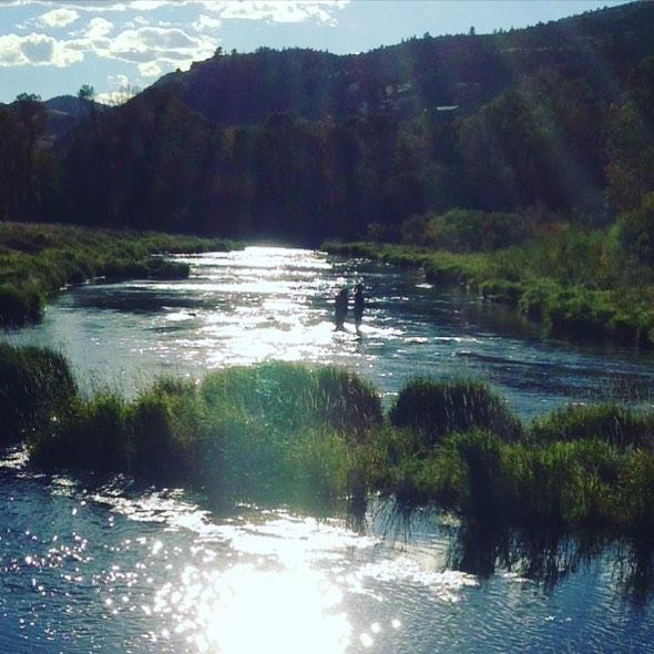 Lou captured this picture toward the end of the day fly fishing. See how gorgeous it is?? That's me and our guide, Jackie.