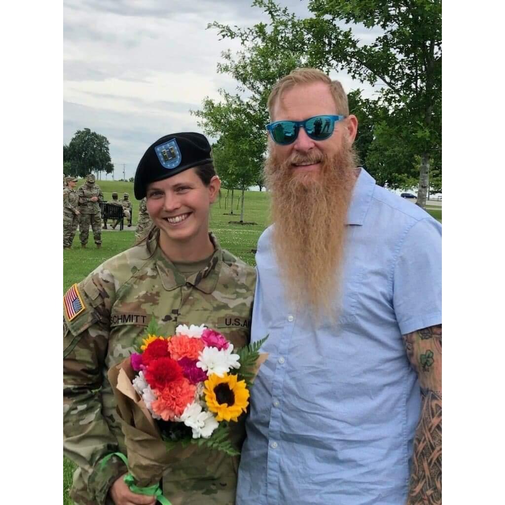 He got the flowers and she got the flower shaped tux cuffs.