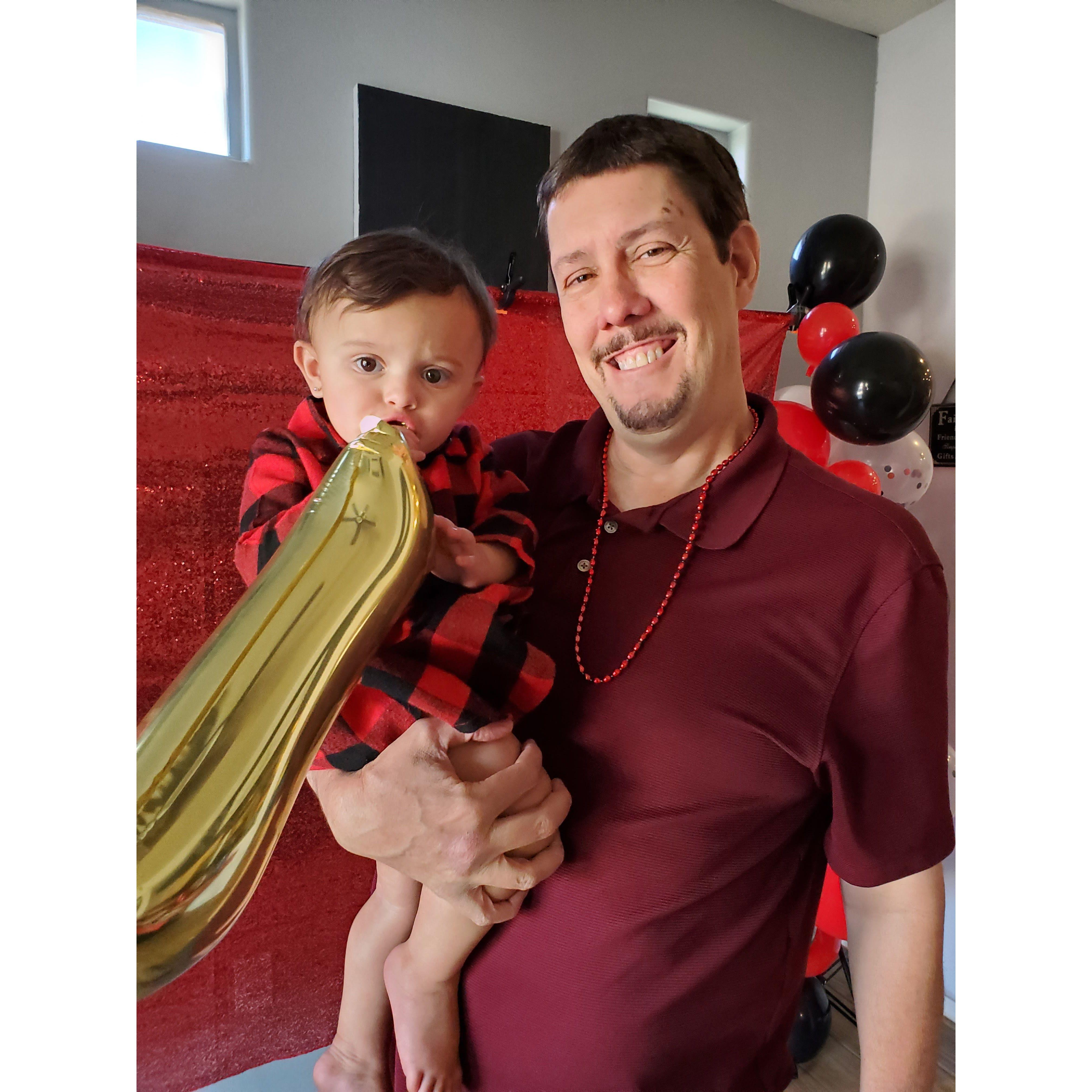 John and baby Sophia, Lori's granddaughter, at her 1st birthday party.