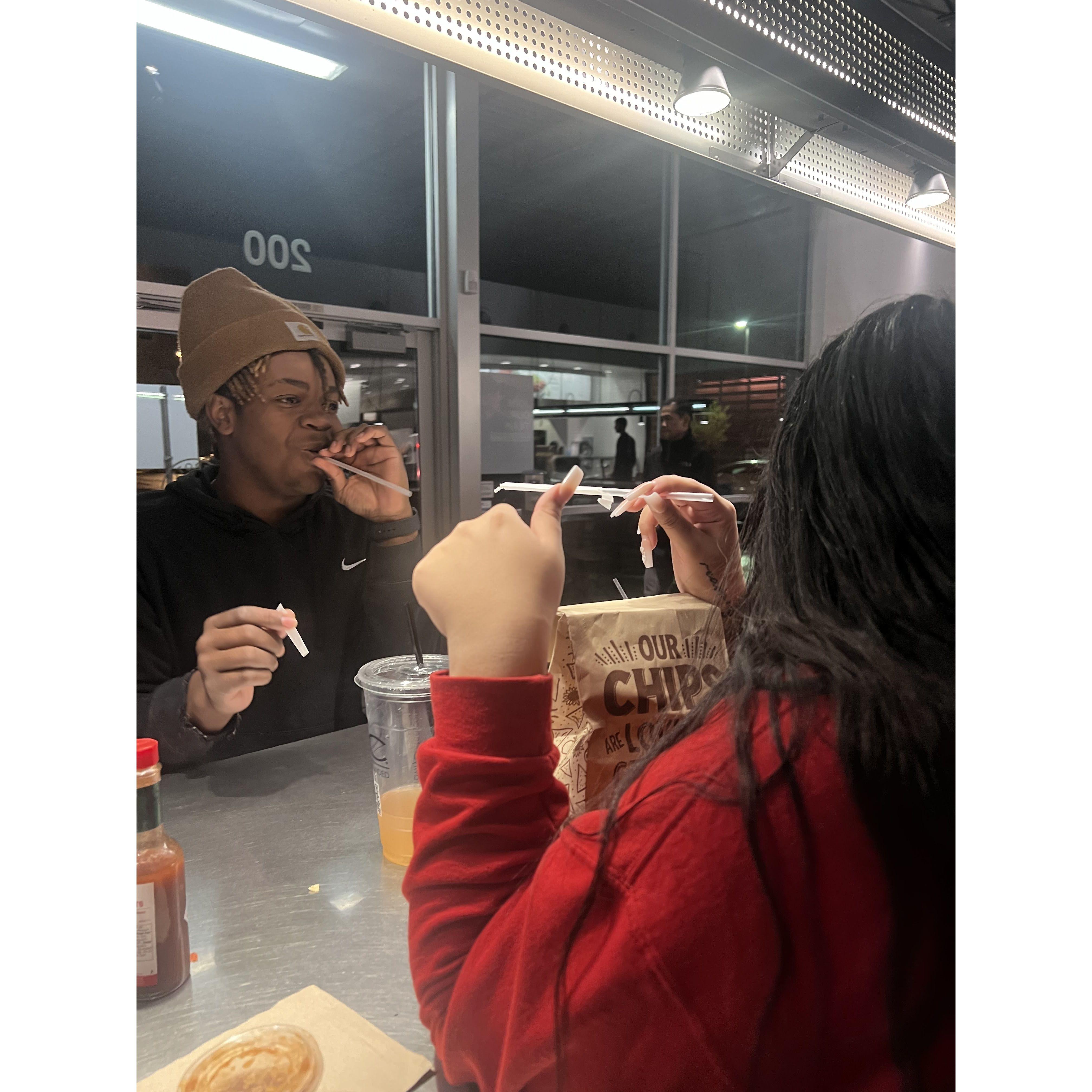 more candid moments of us blowing the paper off of the straw at each other LOL -captured my Christiana
