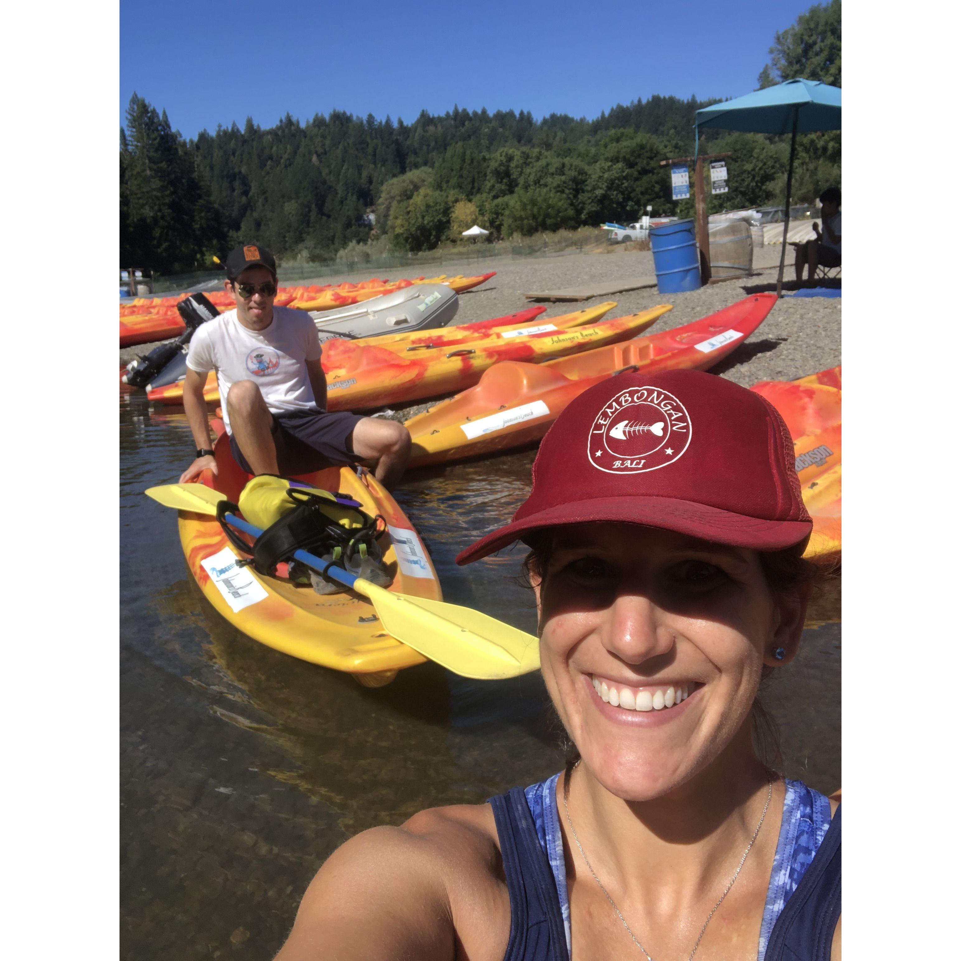 Paul concentrating very carefully while getting into a kayak on the Russian River.
