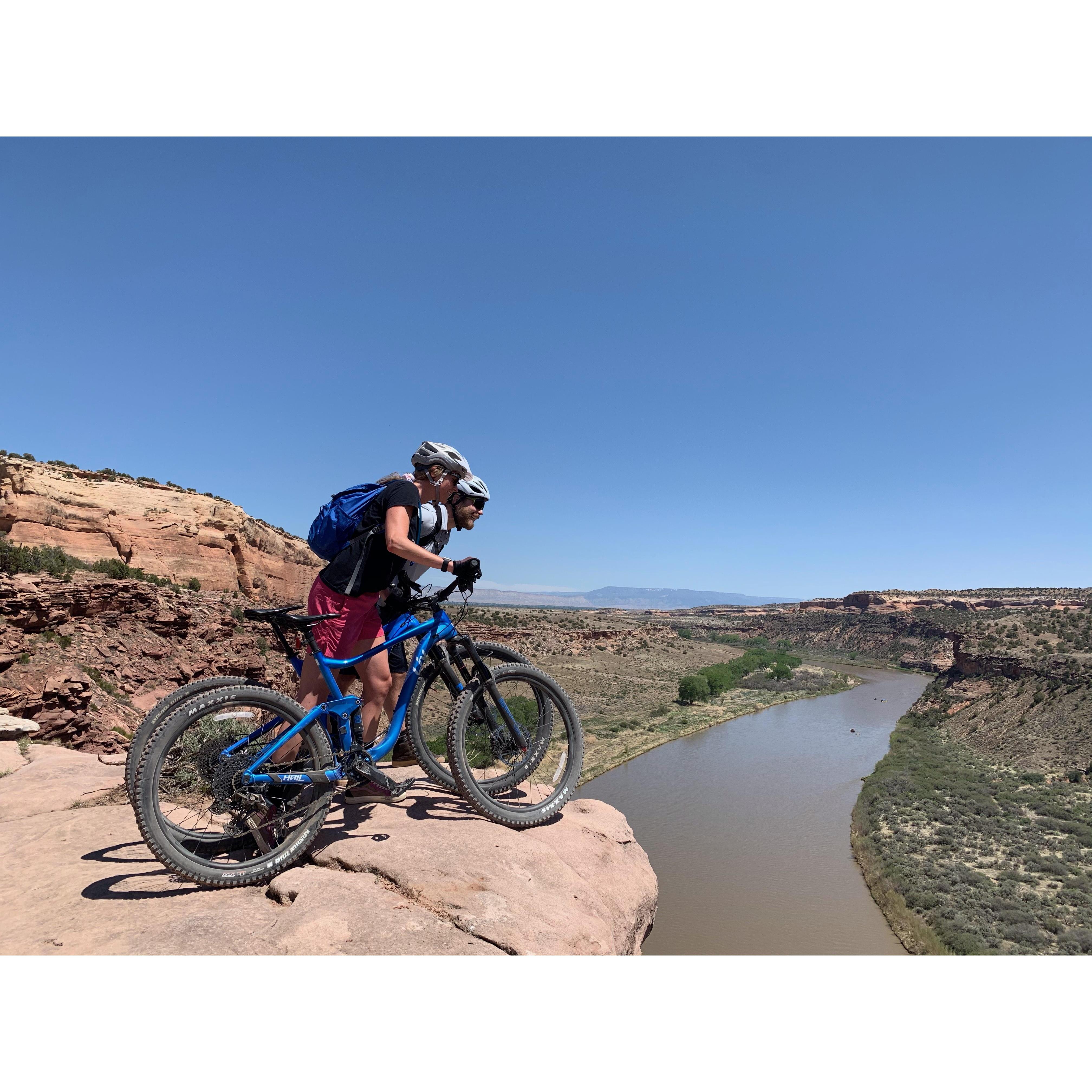 Mountain biking on the edge of the Colorado River- Fruita, CO