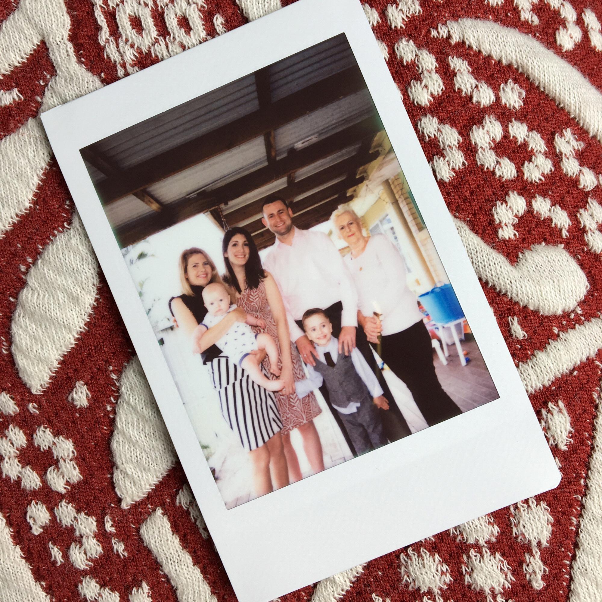 Meeting Vinnie's family (sister - Dom, nephews - Charlie and Lachy, mom - Judy, and brother-in-law - Derek (taking the picture!)), at Charlie's baptism in Australia