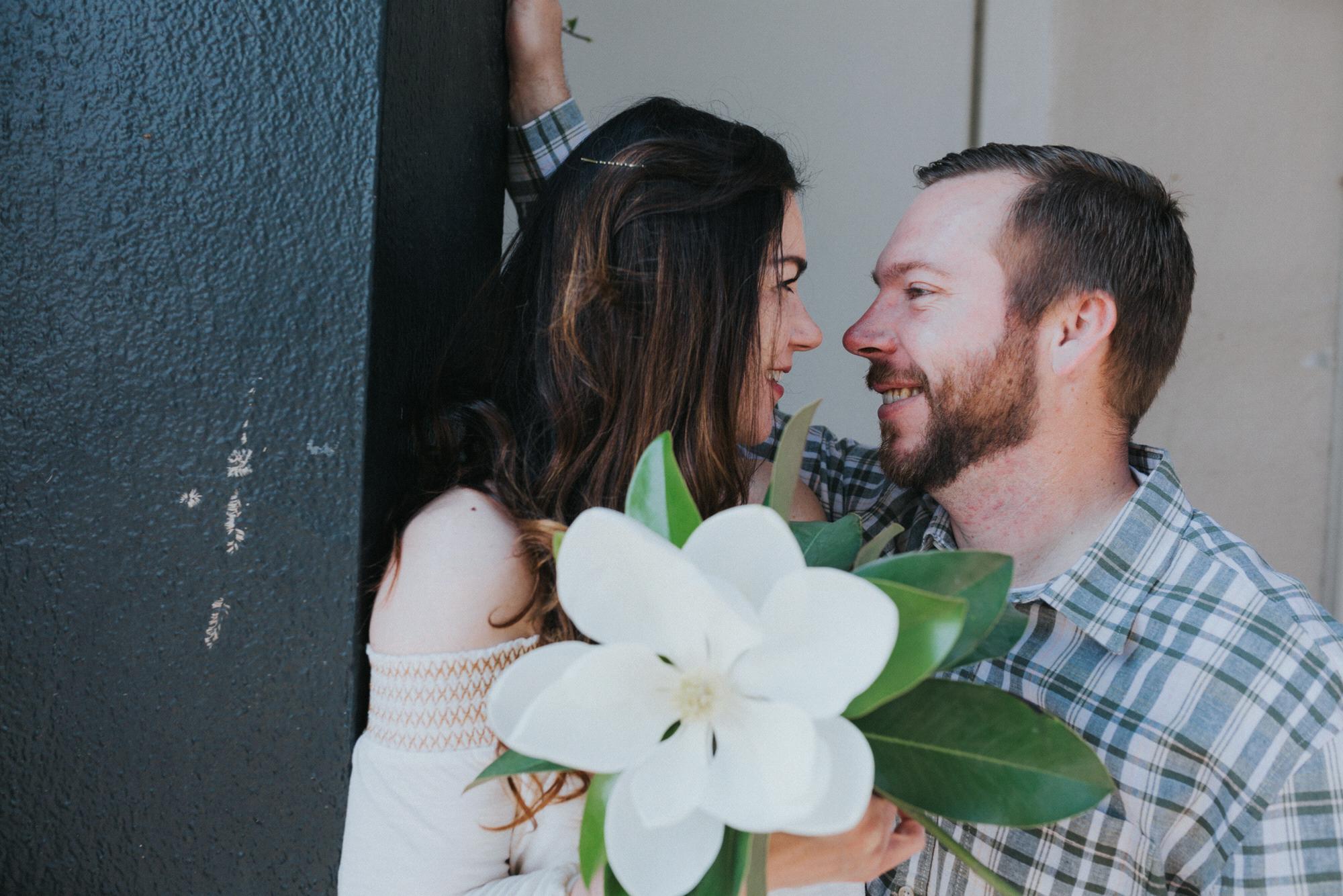 The bride may have mangled a tree to get that flower.