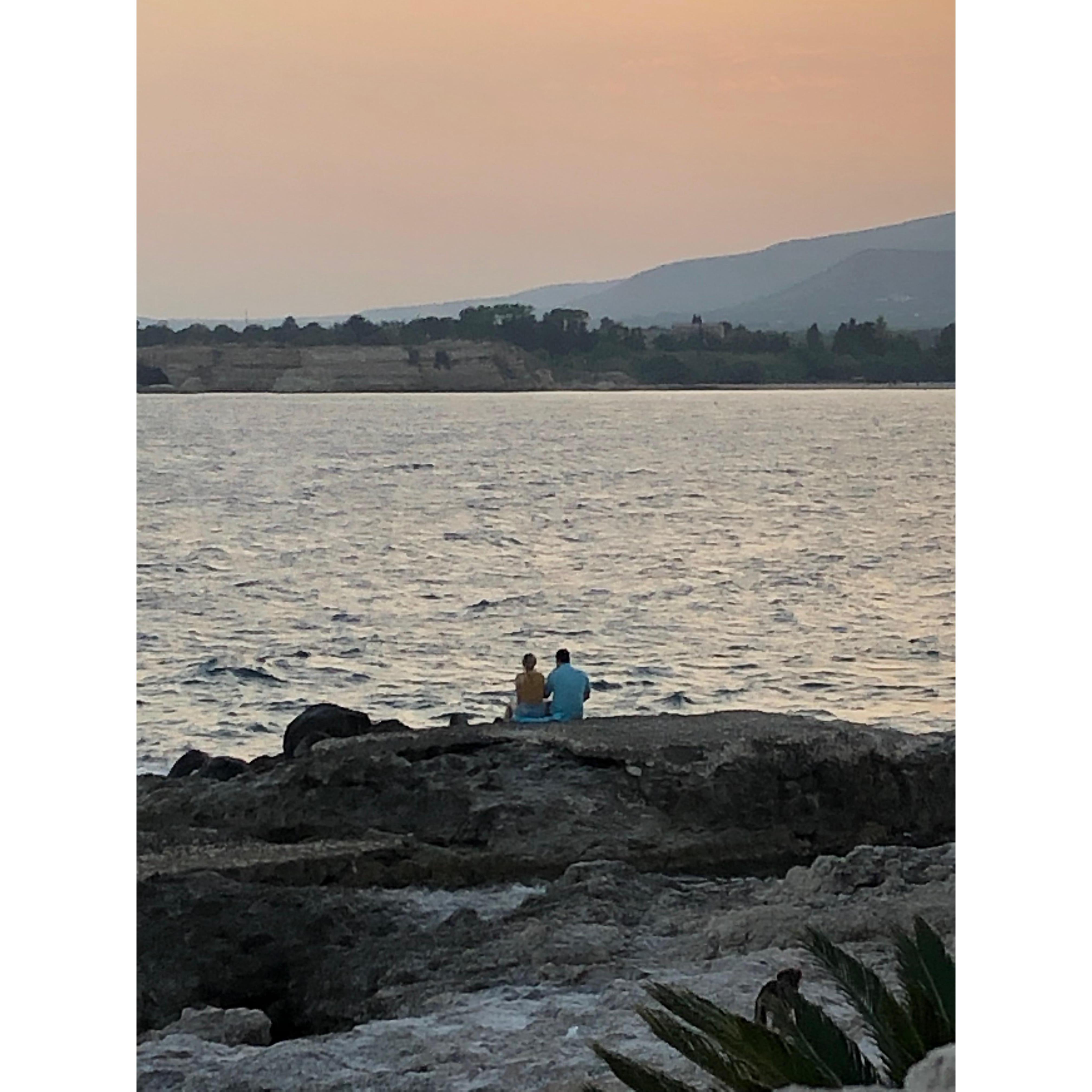 Watching the sunset on the lava rocks in Fontaine Bianche right before Sonny proposed!