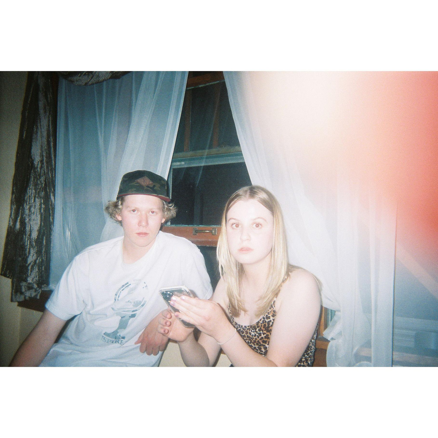 Isobel and Drew's first picture together (a polaroid)