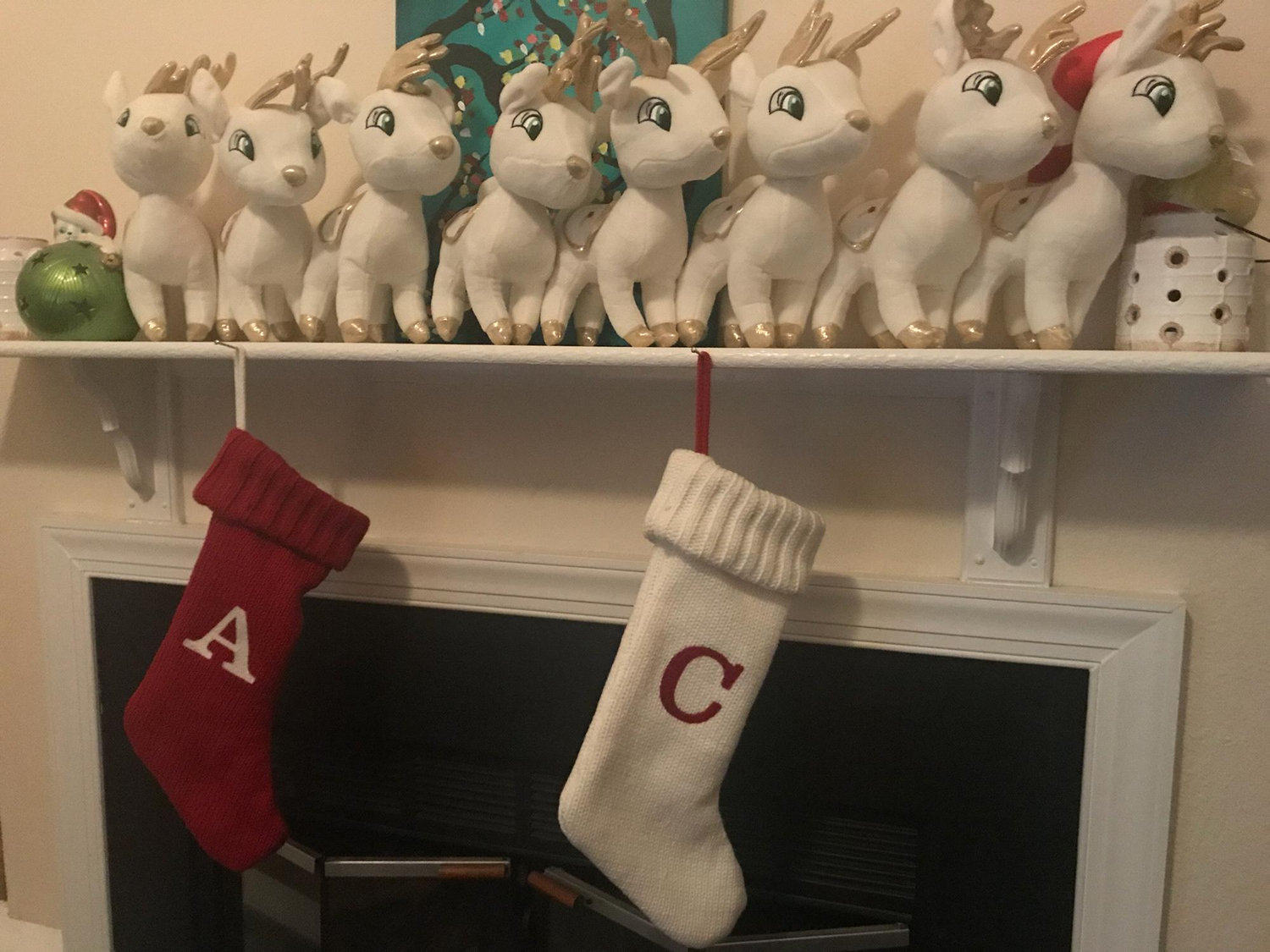 Our 2017 Christmas mantle! Angela won all of the reindeer from the claw machine at her work. Truly a feat. All of her employees and regulars assisted her in getting them.