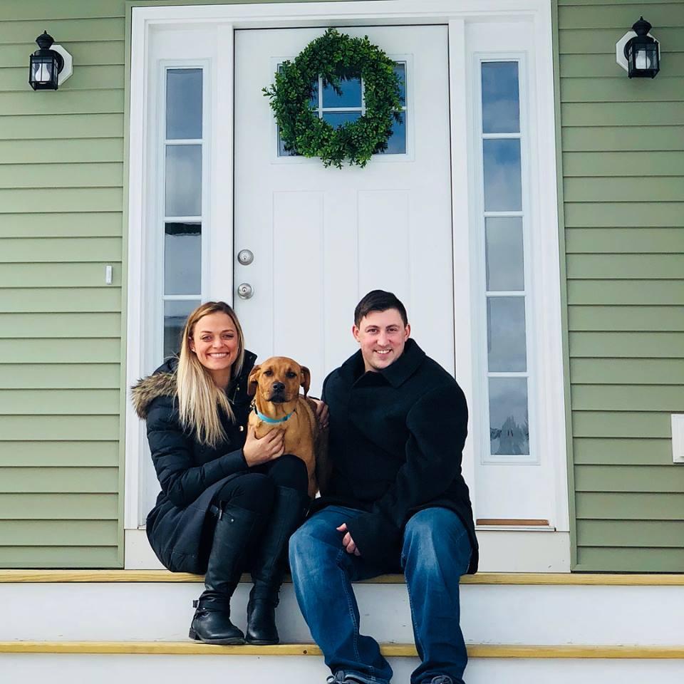 Our first photo with our new home and newest addition to our family.