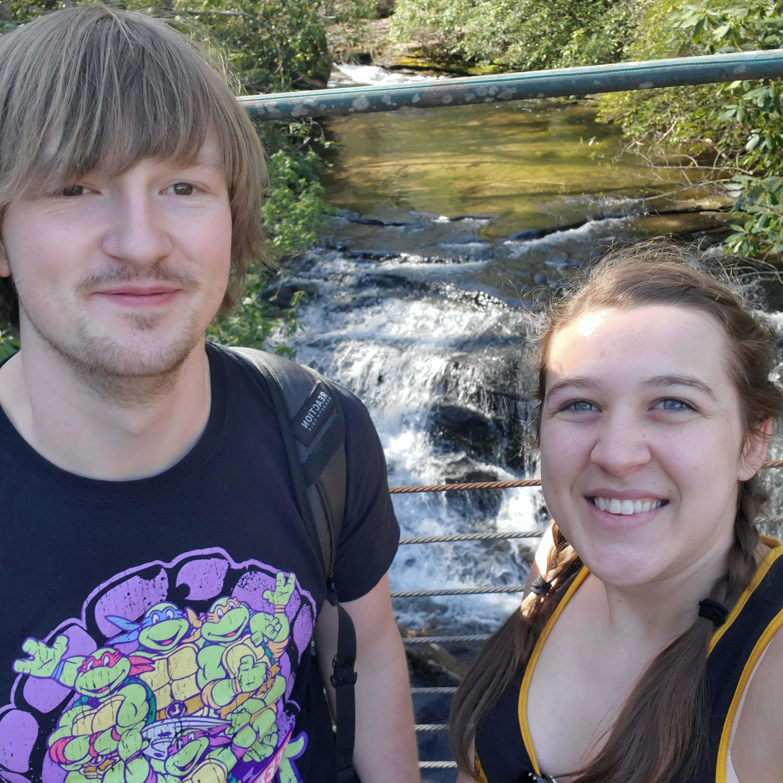 Made it to the waterfall on our hike (he had just proposed about 10 minutes ago)