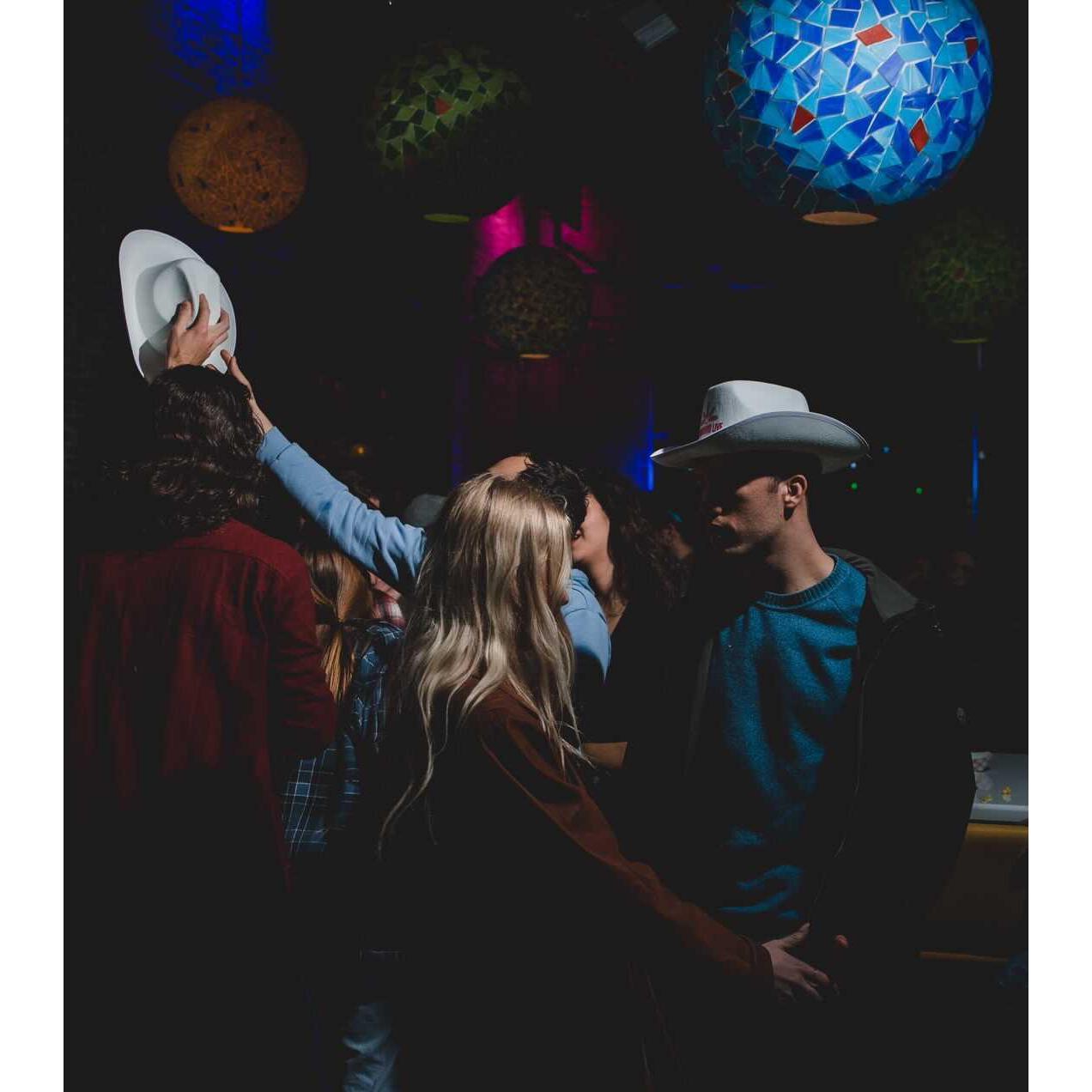 night out with cowboy friends at 80s bar