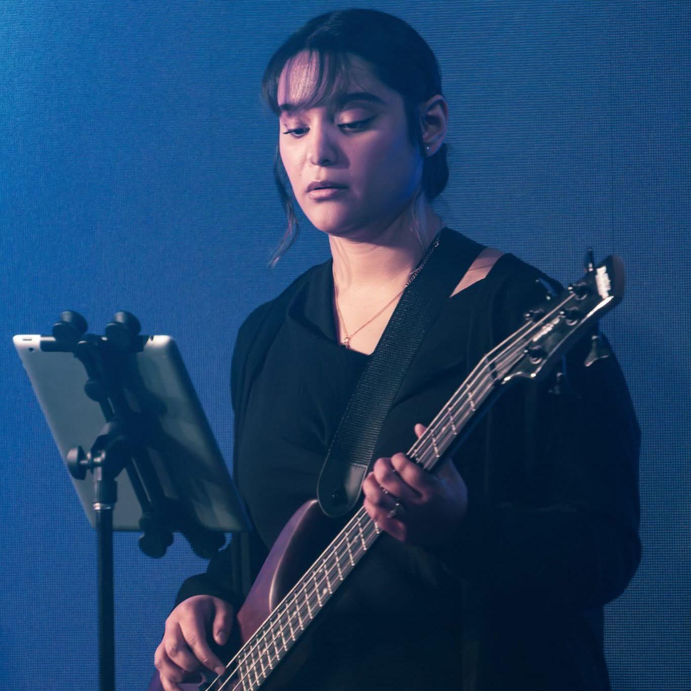 Jess playing bass on worship team at our church!