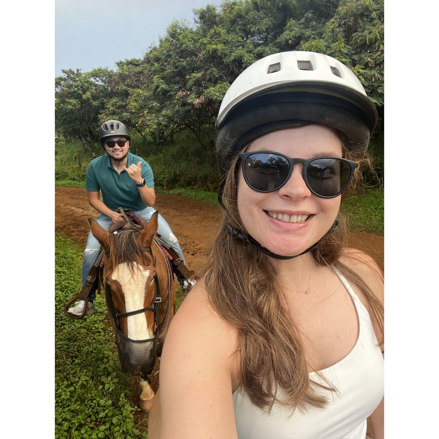 We love riding horses together! This was in Hawaii in 2024.