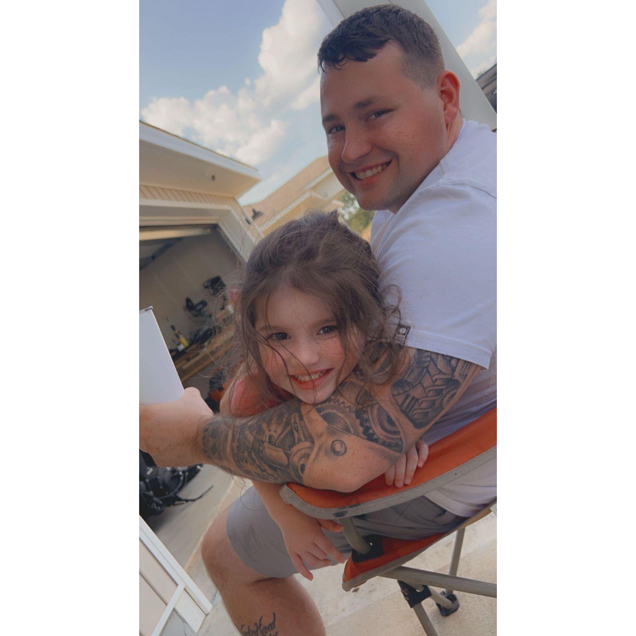 Olivia only wanted to sit with super daddy!