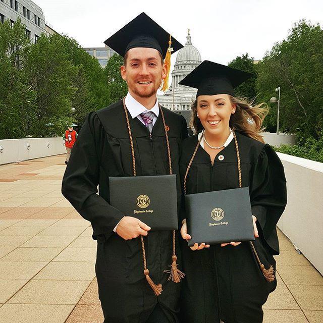 Graduation day, capturing us holding the most expensive pieces of paper we own!