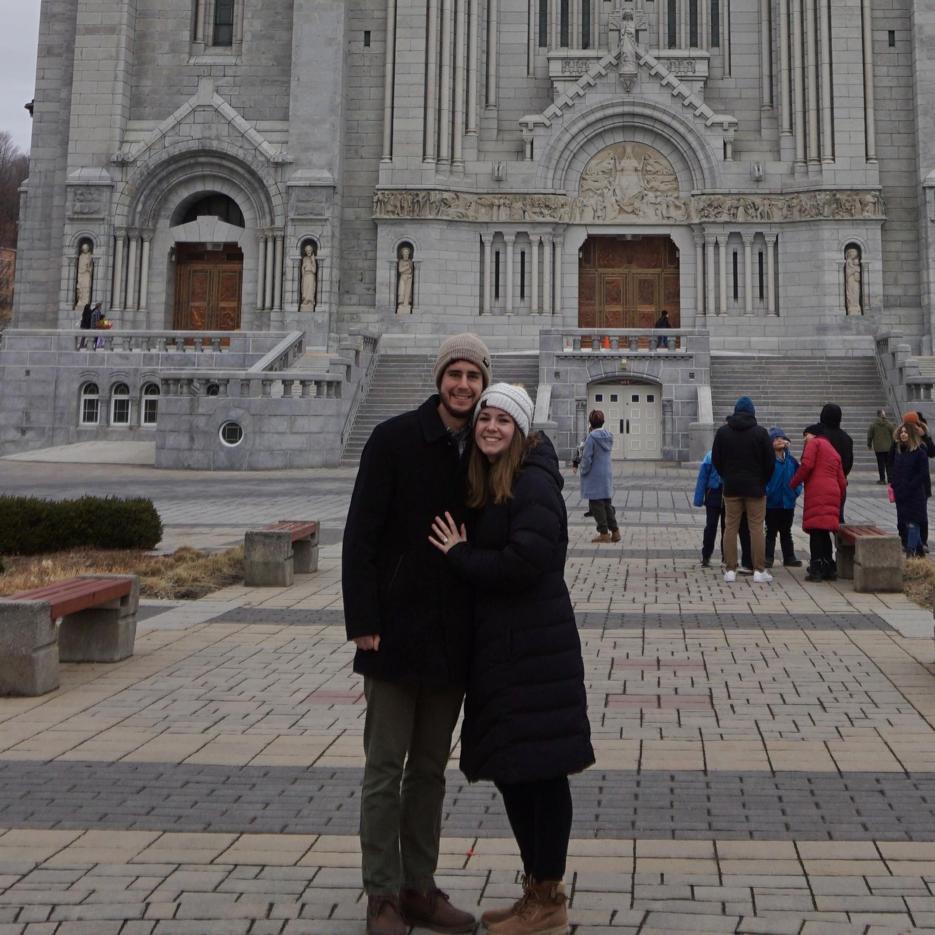 Outside of the Basilica of Sainte-Anne-de-Beaupré in Québec right after we got engaged