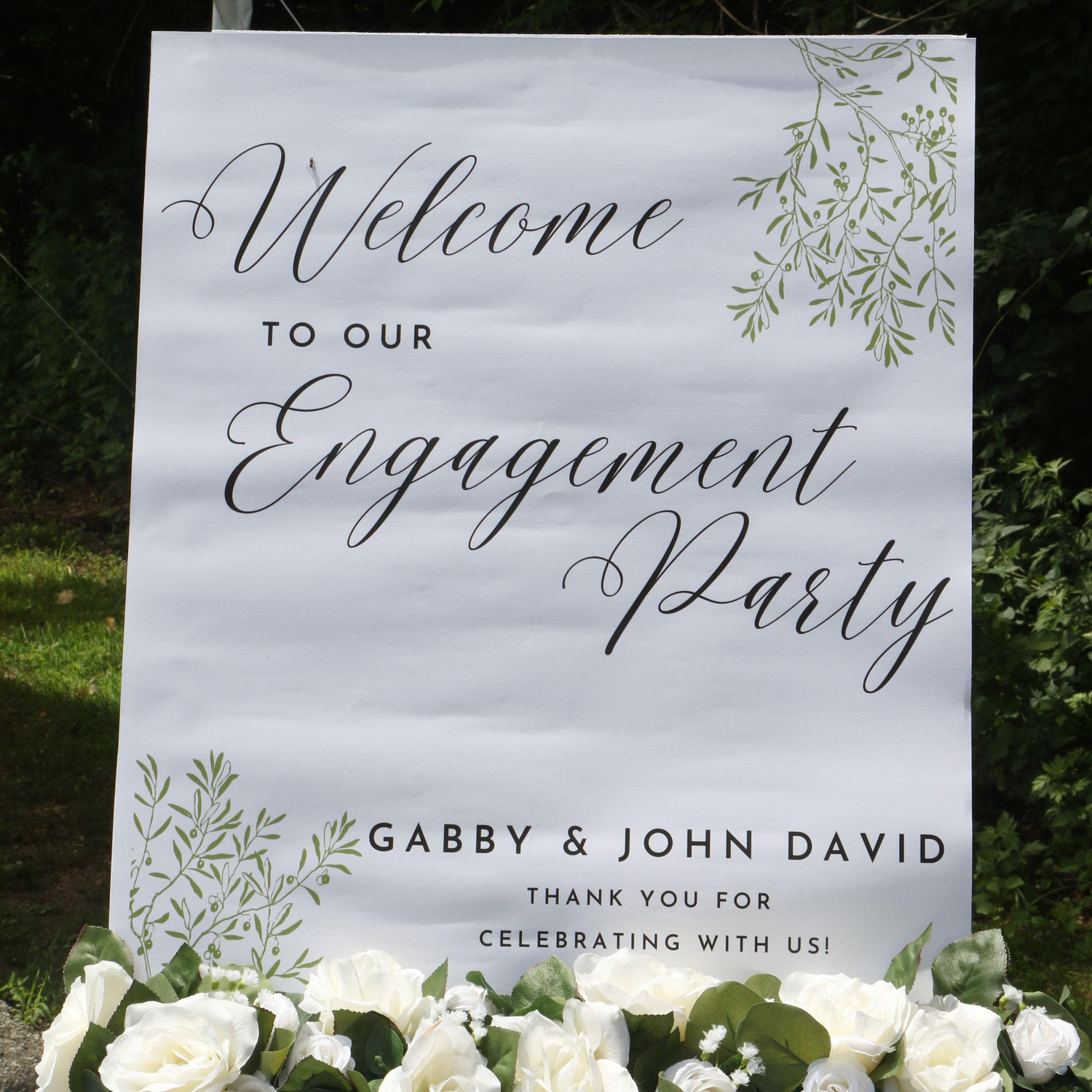The beautiful engagement party sign made by JD's sister, Kiely